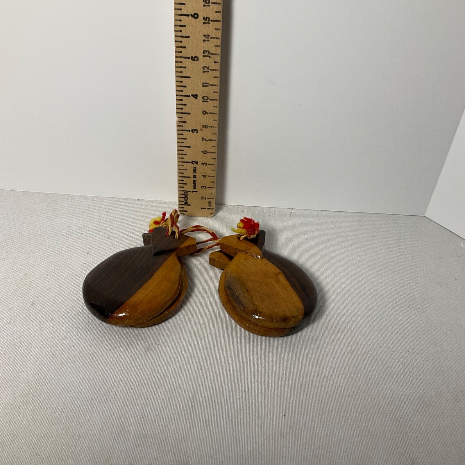 Pair wooden two toned castanets