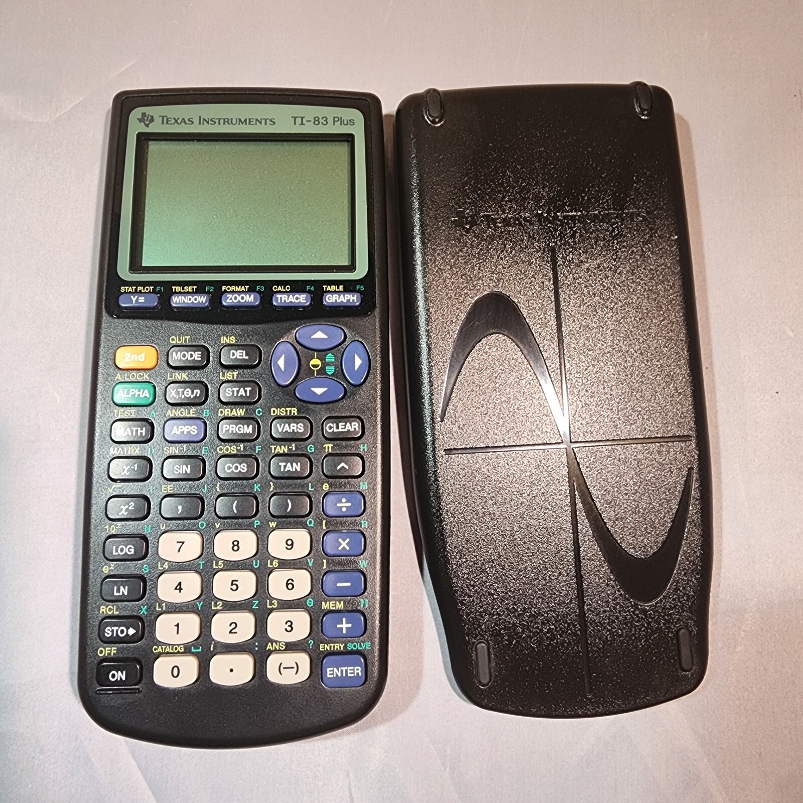 Texas Instruments TI-83 Plus Graphing Calculator With Case