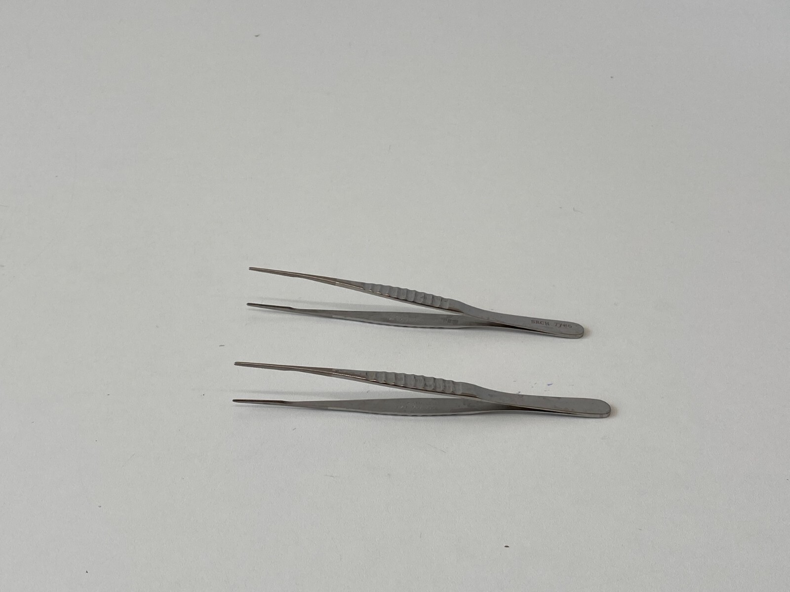 L35: Lot of 2 Pilling 18-1104 Dressing Forceps