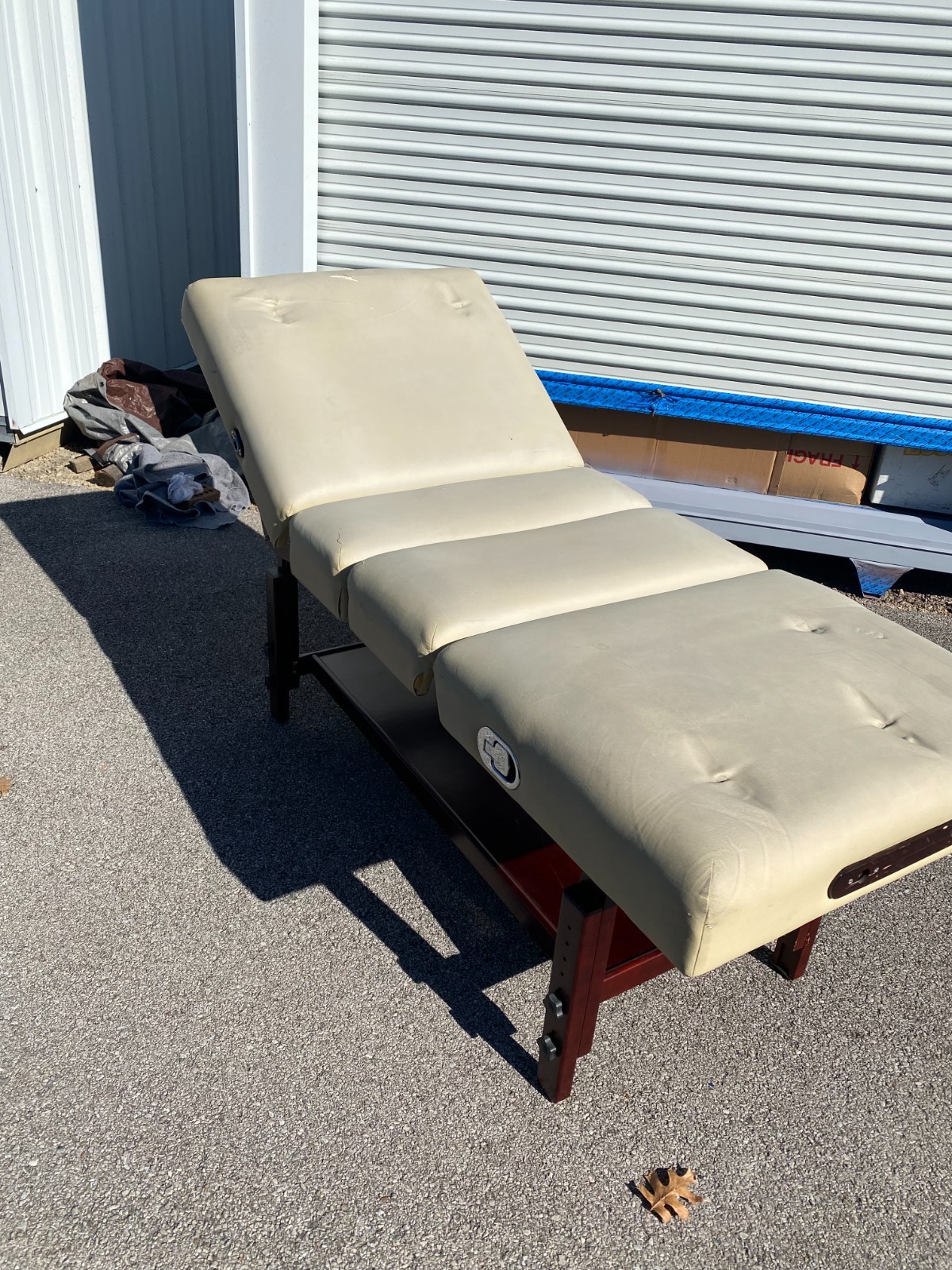Stationary pneumatic adjustable massage table. 75"x30"x28-35"