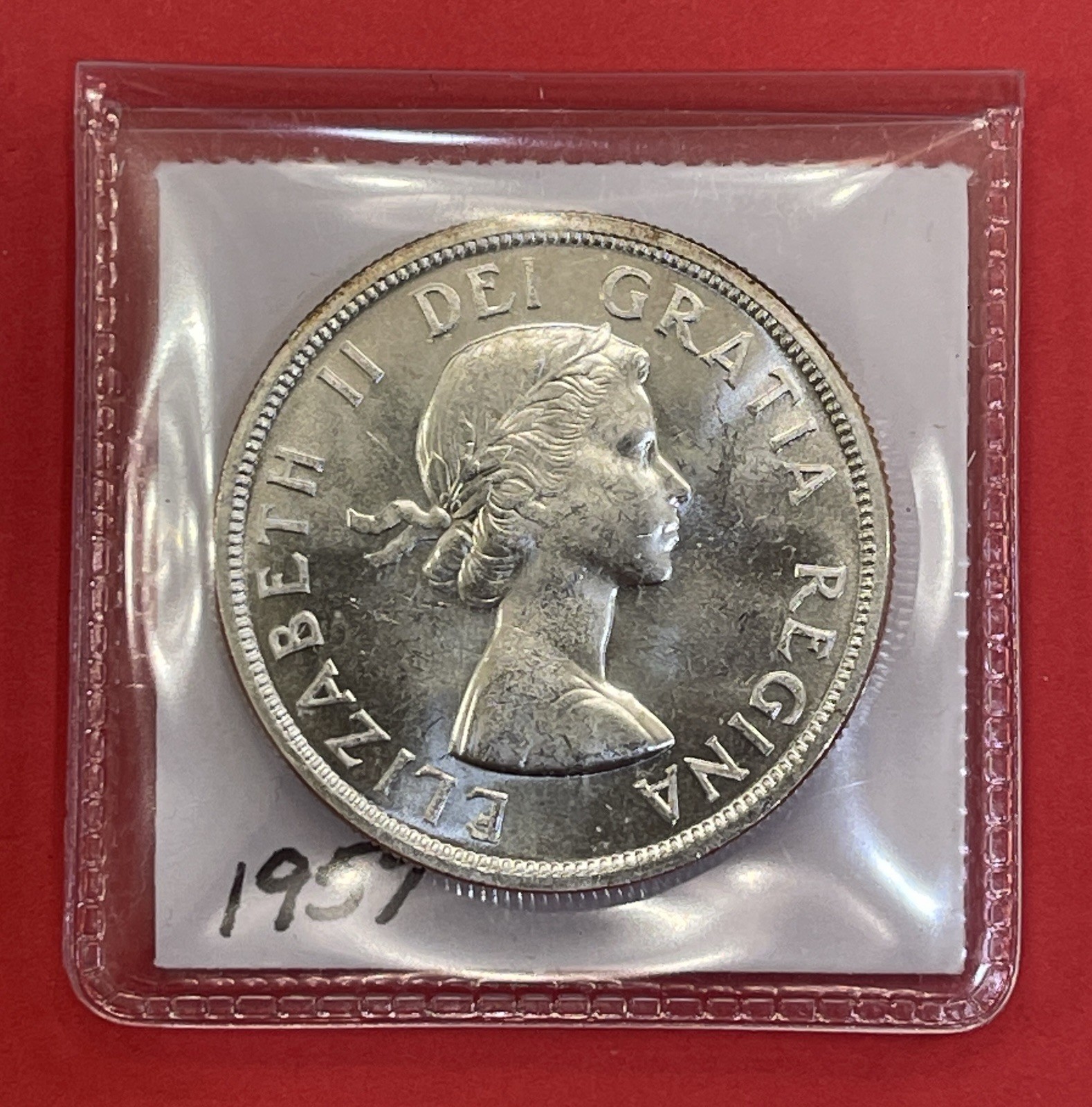 1957 Canada Silver Dollar, Uncirculated. Beautiful Dollar.