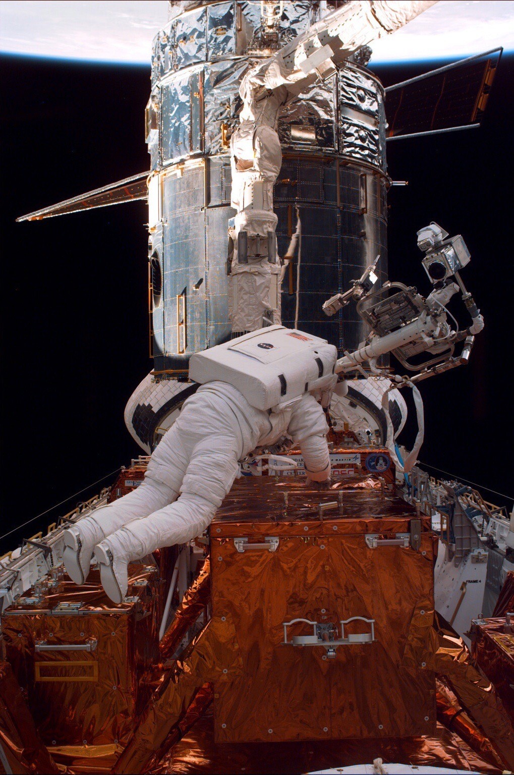 SM2: Astronaut Preparing for EVA HUBBLE MISSION 8X12 PHOTOGRAPH