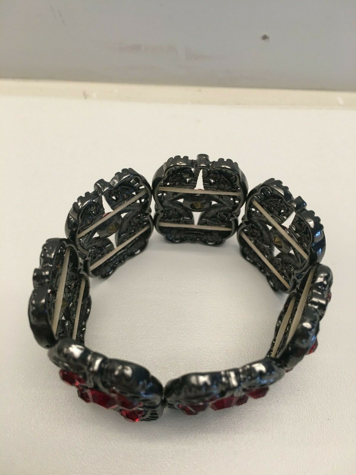 Red Stone Silvertone Bracelet