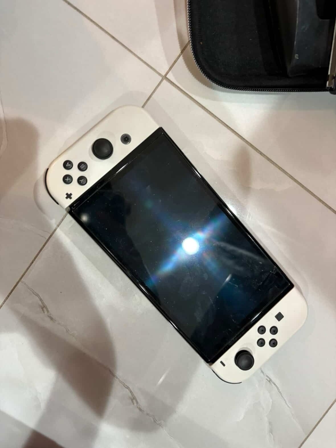 Nintendo Switch OLED, HDMI cable, Joy-Con, Dock, Carrying Case, Grip