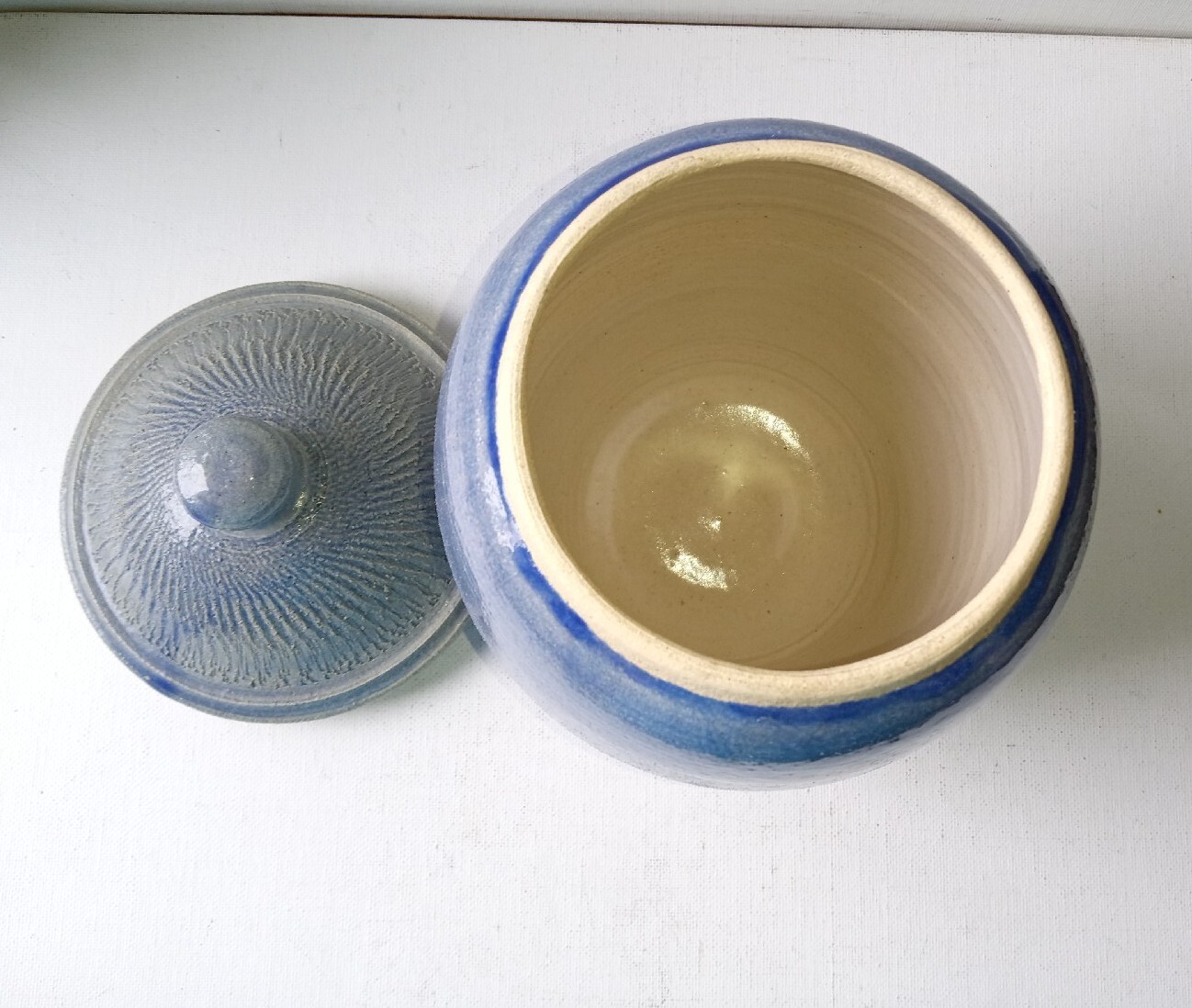Bowring Ceramics Ginger Jar with lid. Light blue with impressed design.