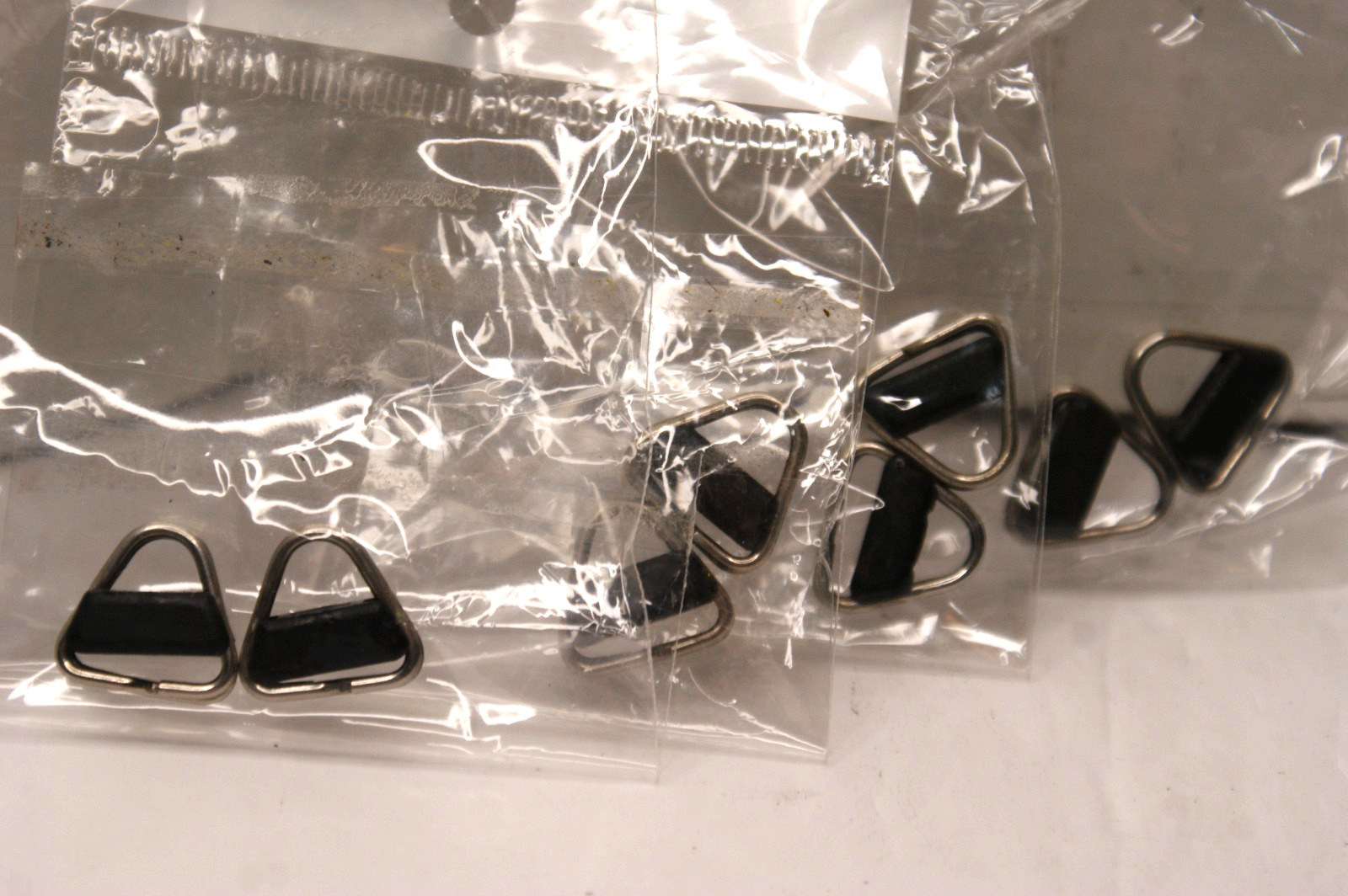 Eight Pairs Of Camera Strap Triangle Hangers