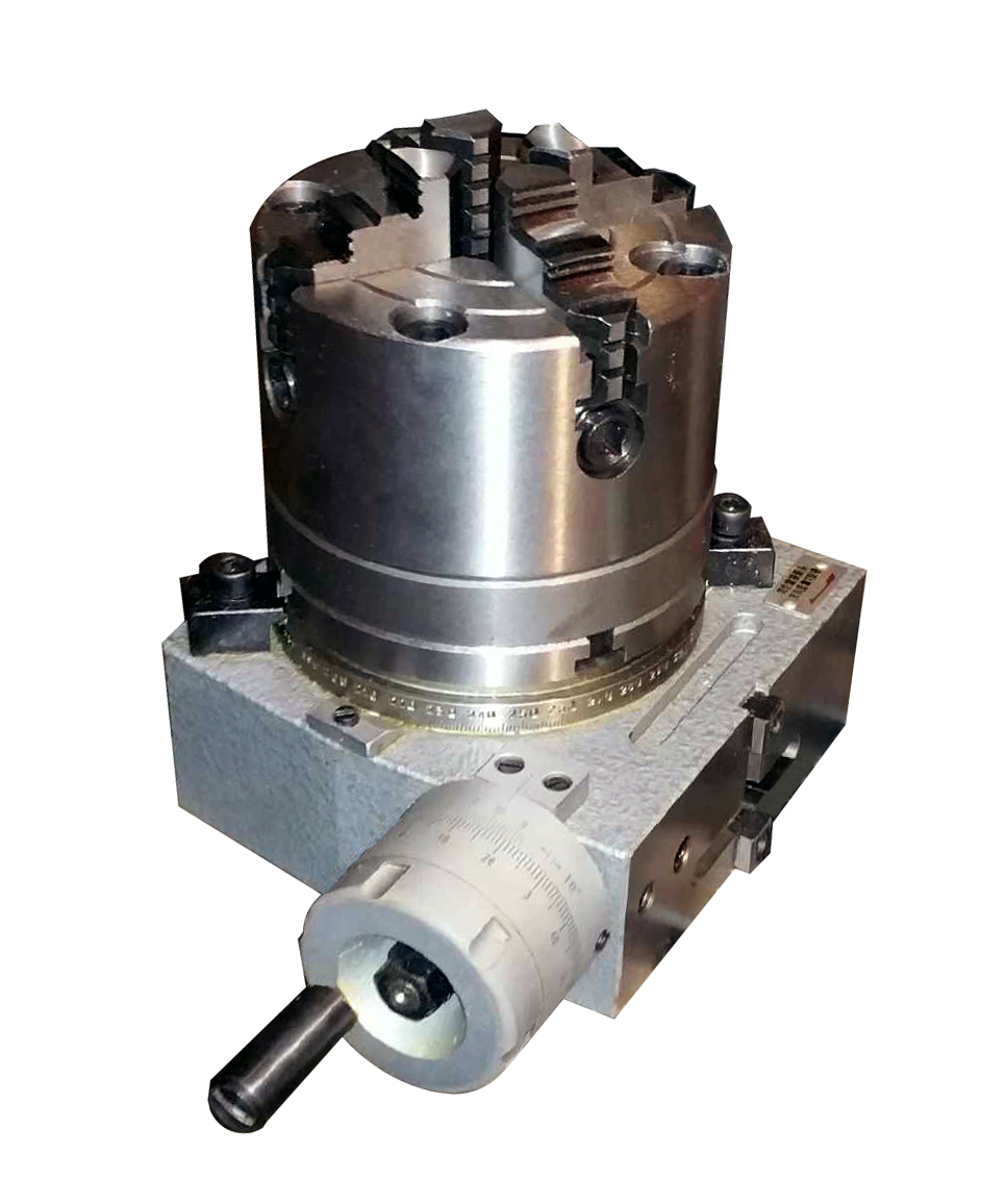The adapter and 4 jaw chuck for mounting on a 4" rotary table