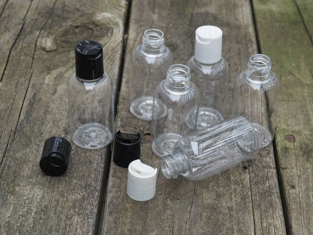 2 OZ. PLASTIC Clear Boston Round  Bottles with black Dispensing  caps  10 PACK