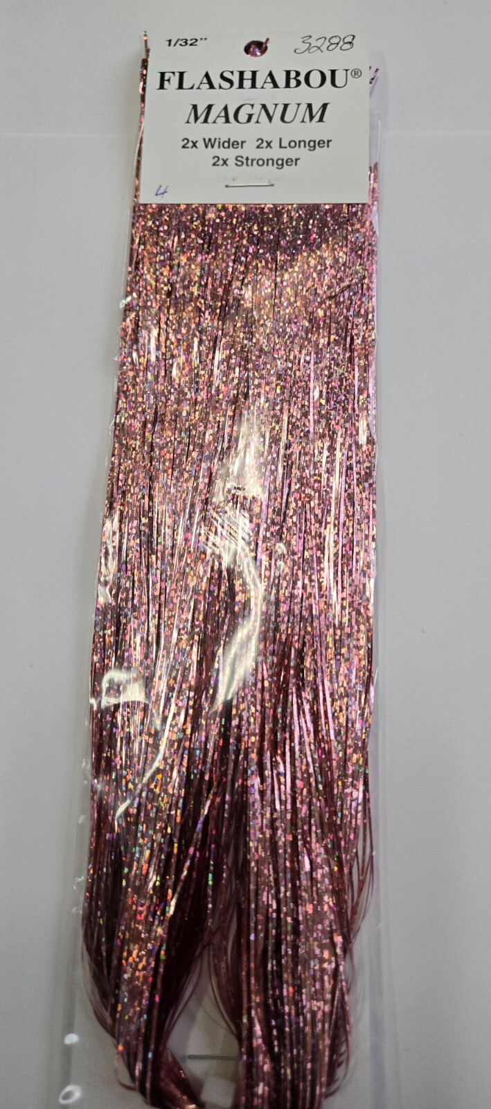 Flashabou Magnum  size is 1/32", 20" long   Color: #3288  Holo Pink  Flash