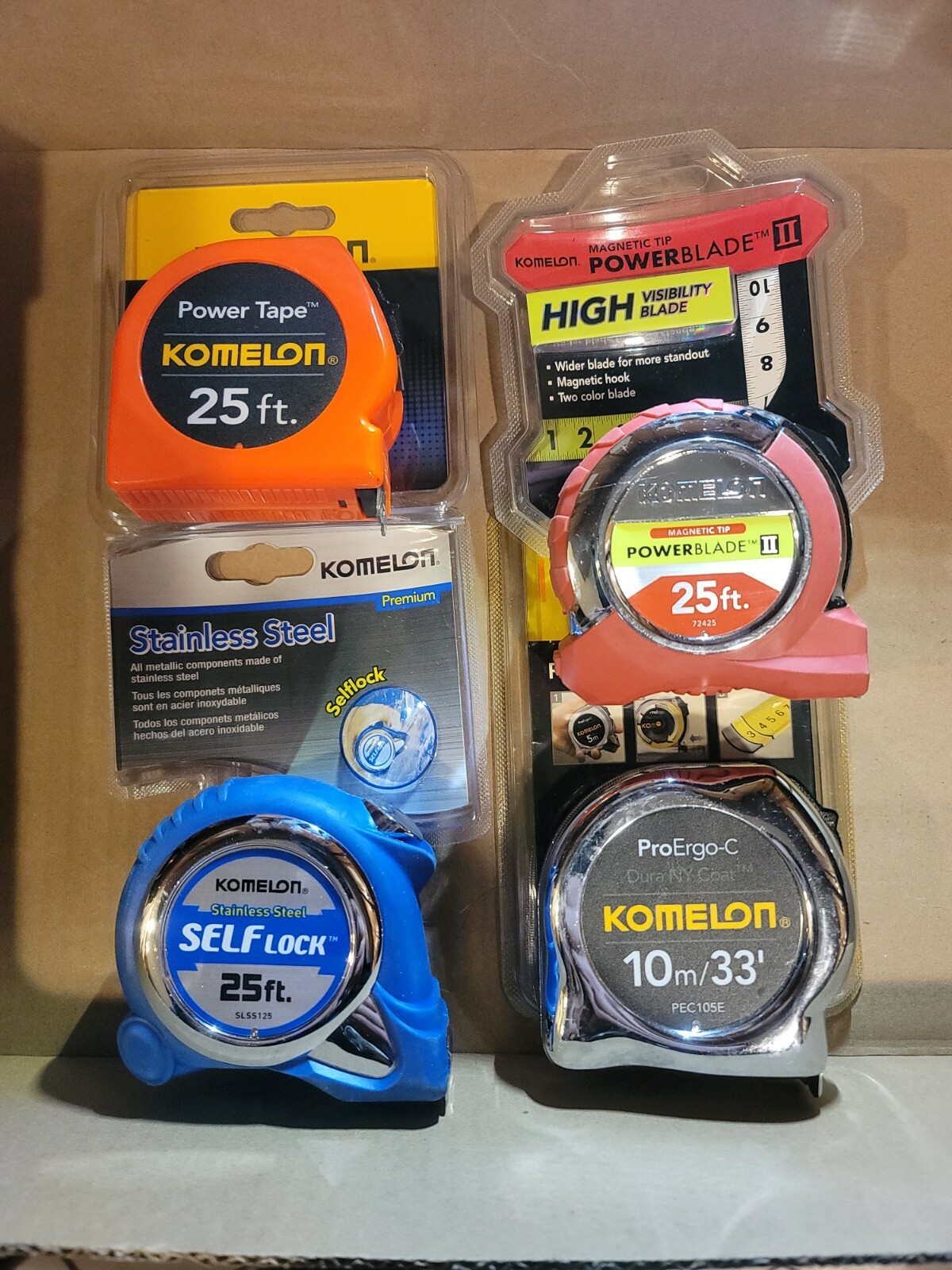4 new KOMELON tape measures 3)25', 1) 10M/33' And a FREE used one!