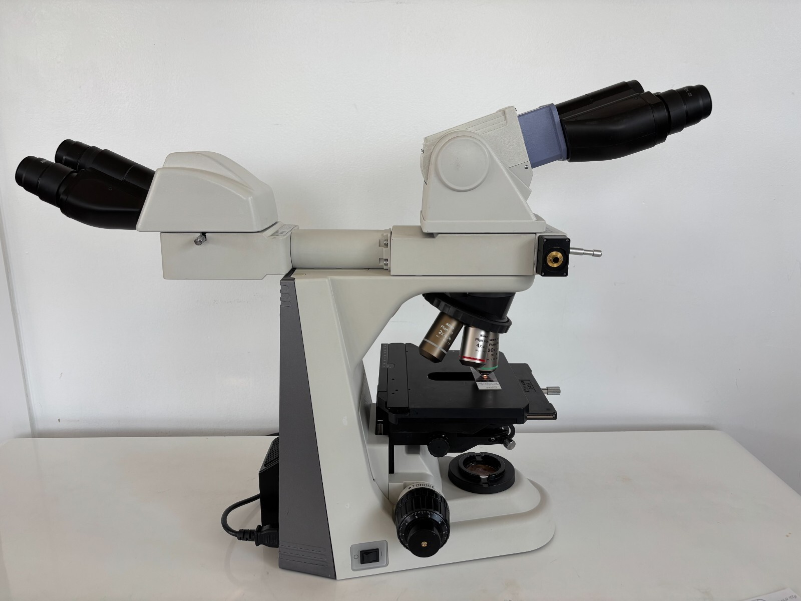 Nikon Eclipse 50i Microscope with 2X, 4X Fl, 20X Fl. Swing Condenser Dual Heads