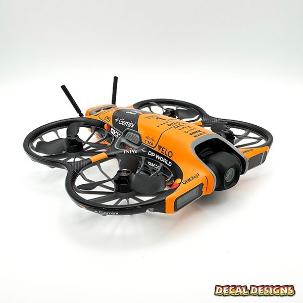 DJI Neo 2 Wrap Skin – Orange / Carbon Fibre F1 Inspired Drone Decal Kit