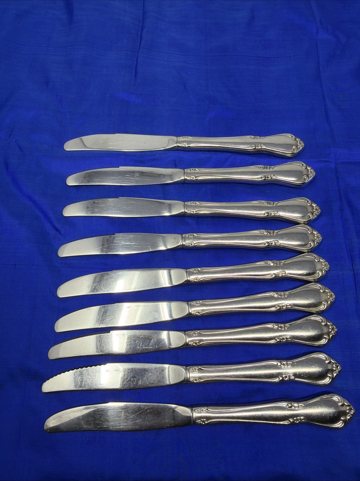 9 Oneidacraft Chateau Deluxe Stainless Steel Dinner Knives Varied Serrations