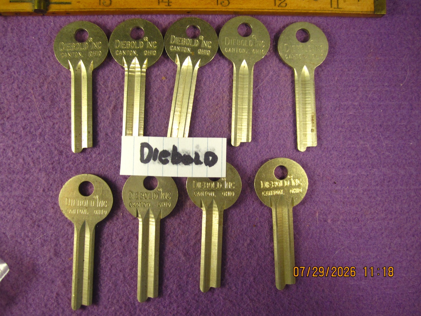 9 PC NEW OLD STOCK  DIEBOLD INC. SAFETY DEPOSIT BOX UNCUT KEY BLANKS BRASS.