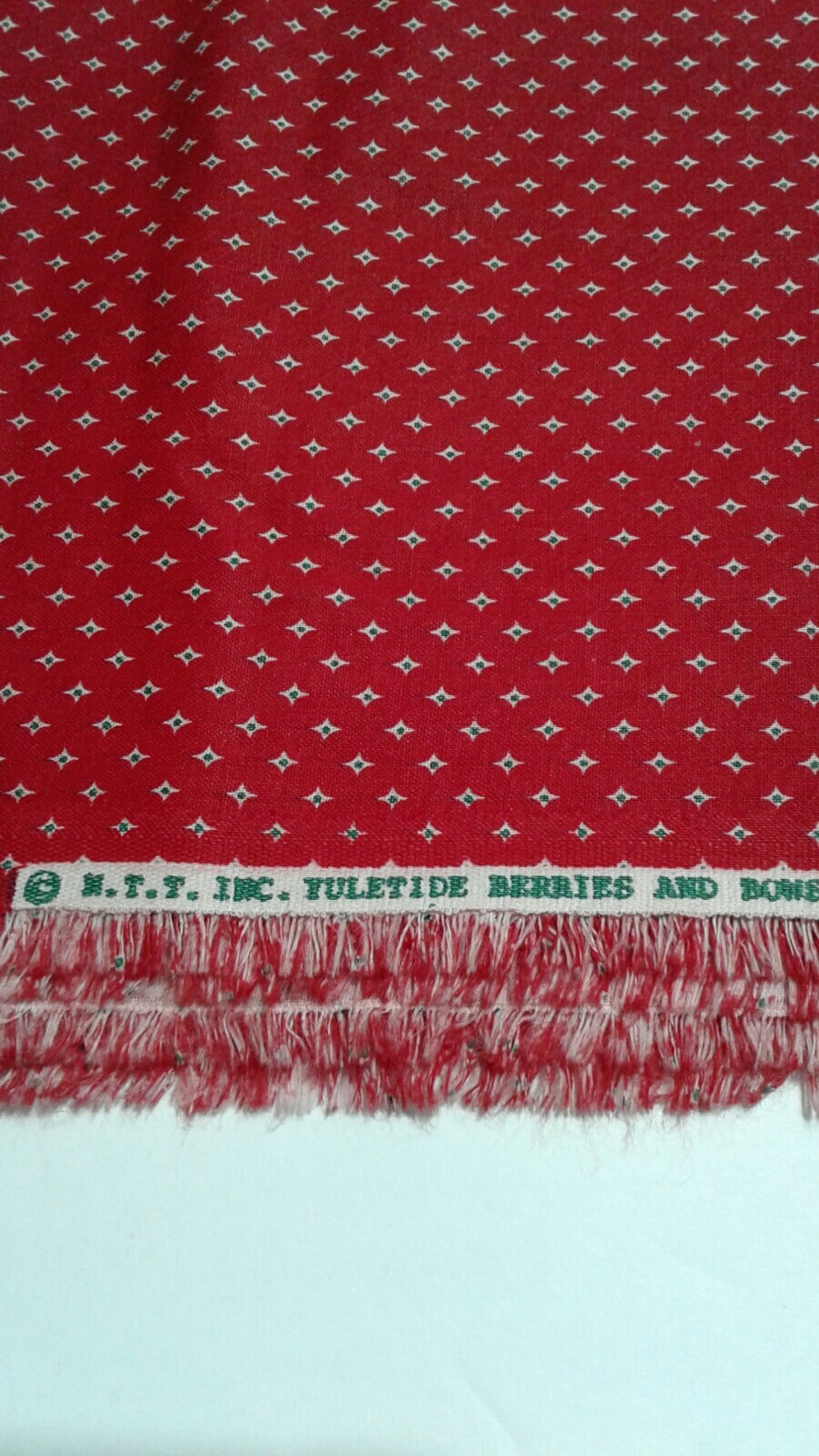 N.T.T. Inc. Yultetide Berries And Bows Material 2+ Yds - 42" wide Cotton
