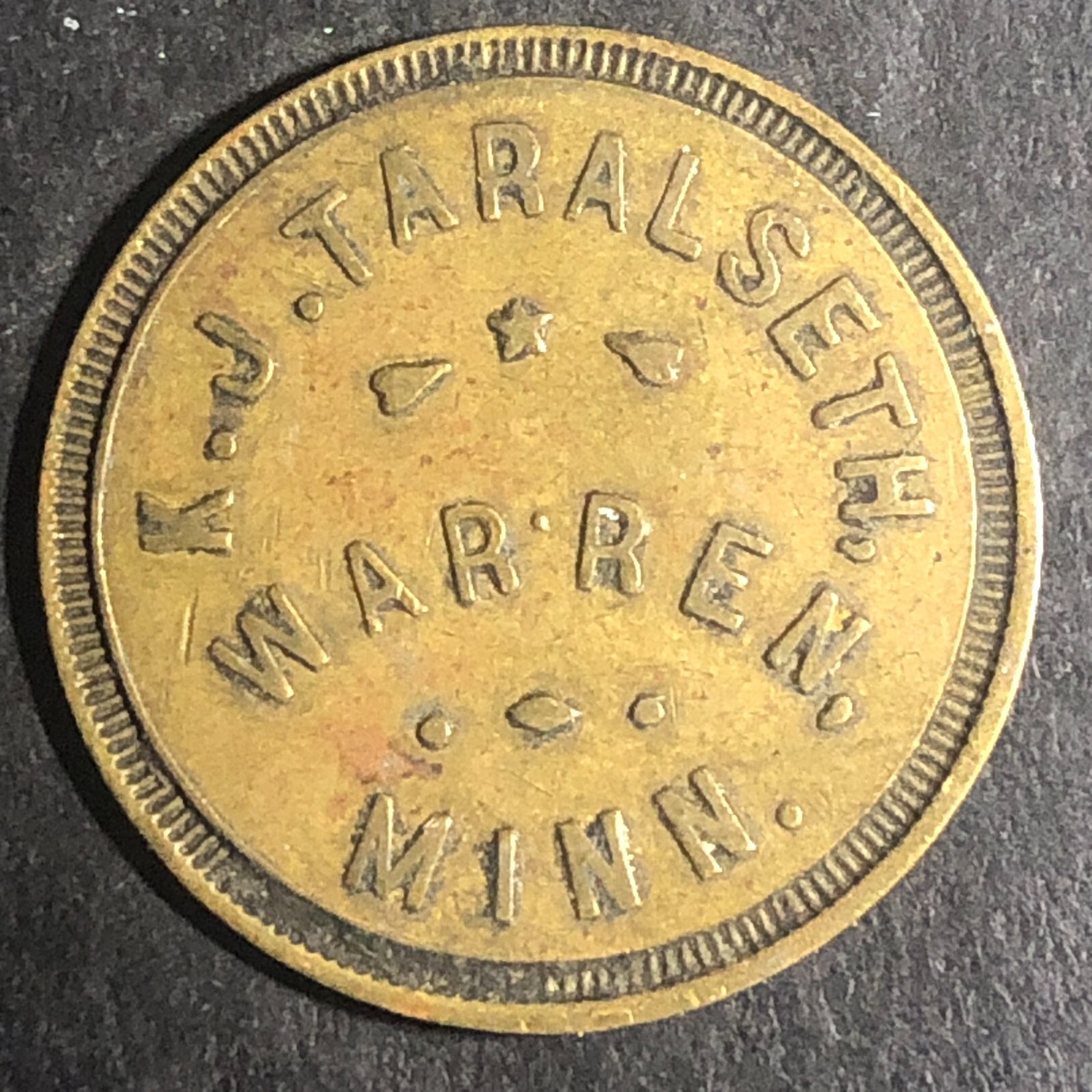 Warren, MINN K.J. Taralseth G/F 25¢ Brass Trade Token 25.7mm
