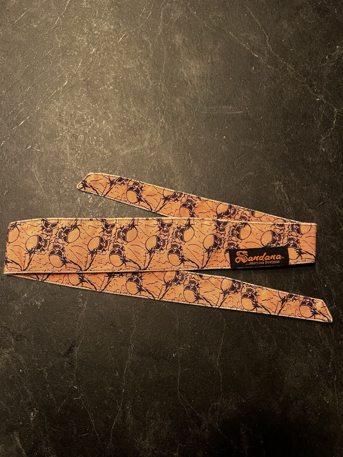 Sandana Flying skulls head band orange