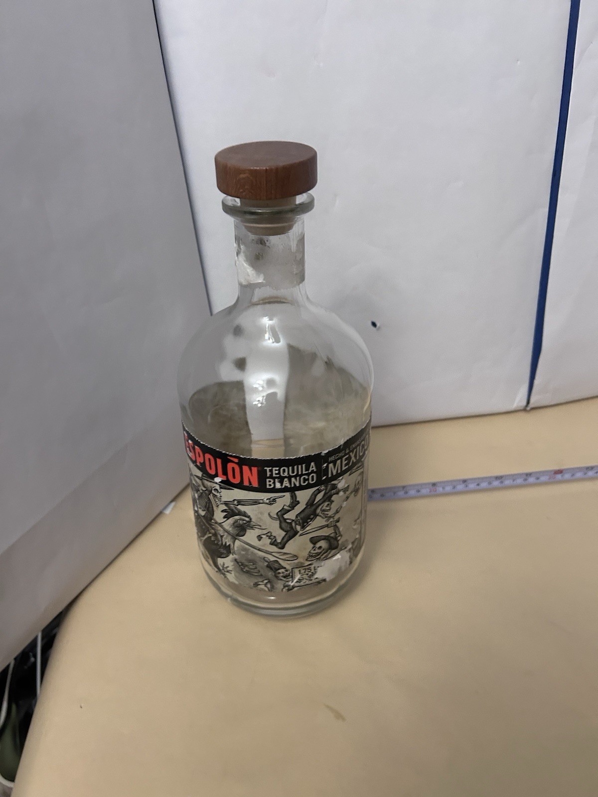 Empty Used Clear 1.75mL Espolon Tequilla Blanco with pop cap top