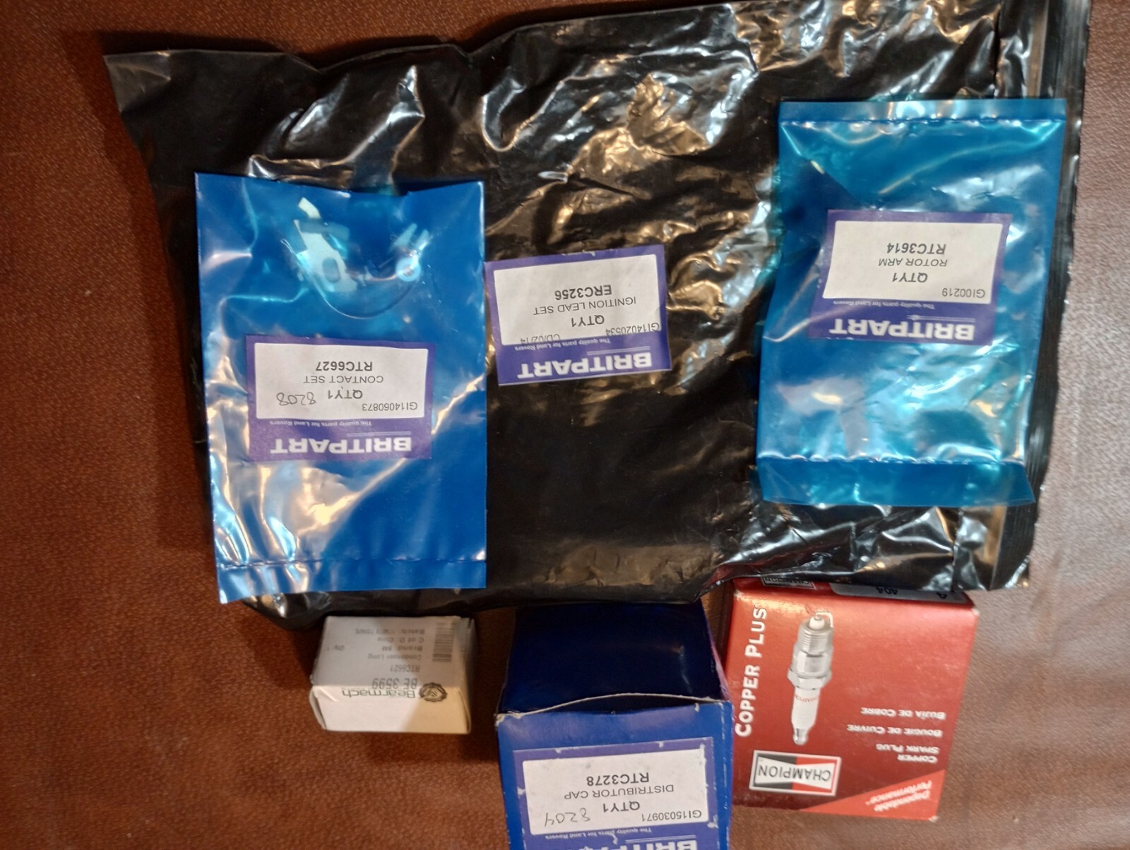 Tune-up kit for Land Rover series 2 and 3 Cap, Wires, Plugs and more.