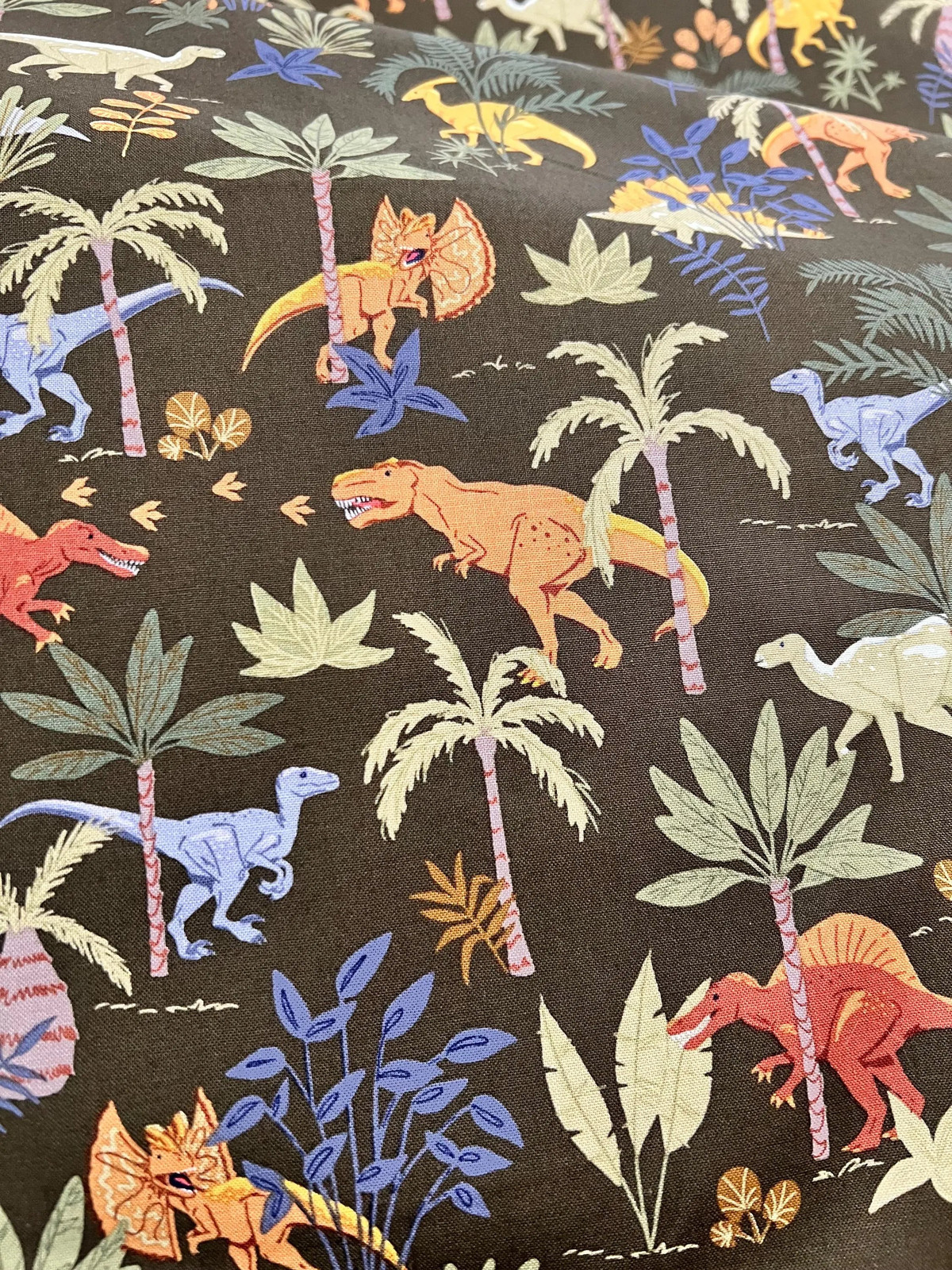 Cretaceous Pebbles Dinosaurs Cornflower Riley Blake Designs - Sold by the yard