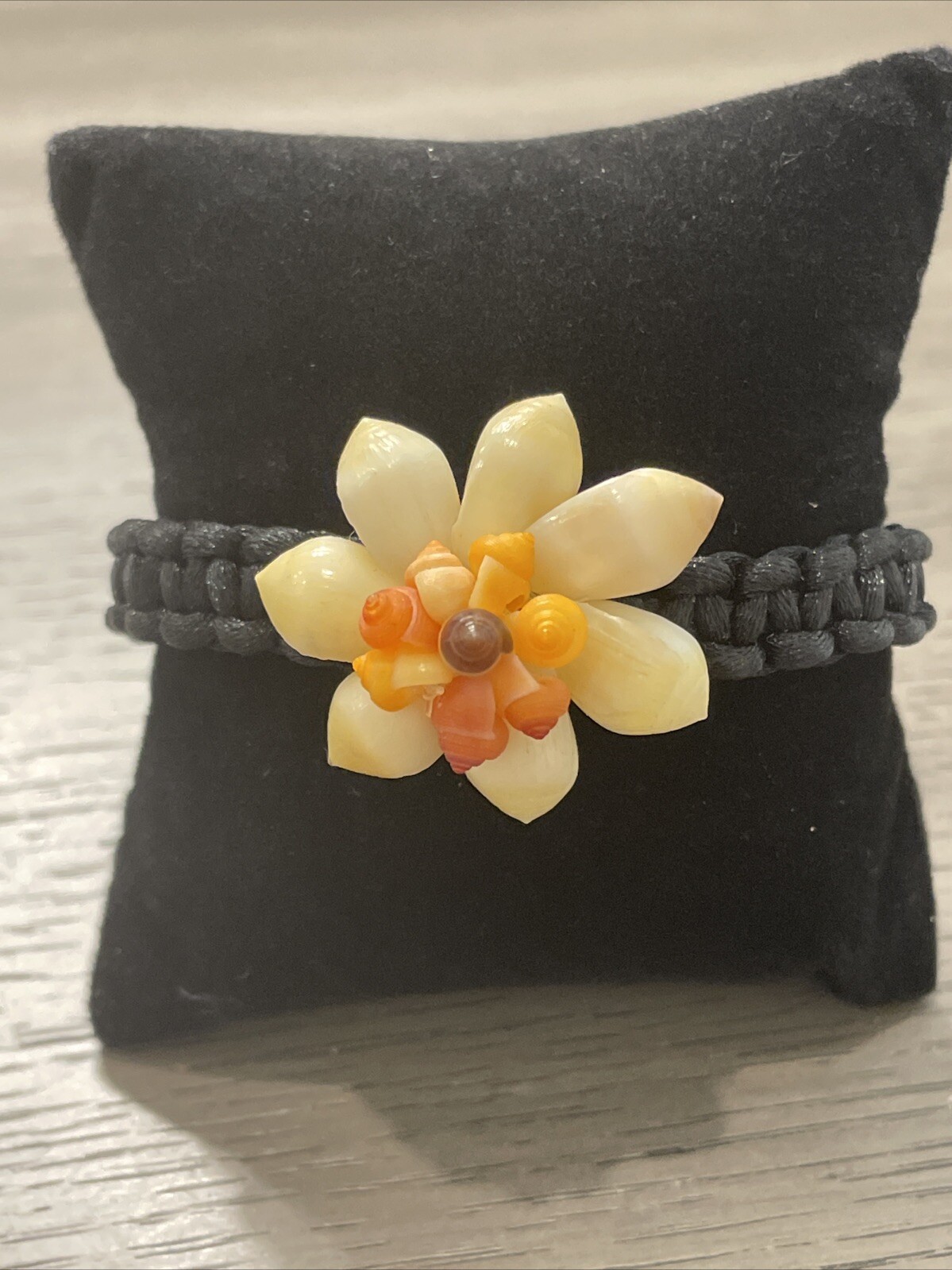 Handmade Shell Flower Bracelet On Braided Cord ~ Cream & Orange On Black Cord