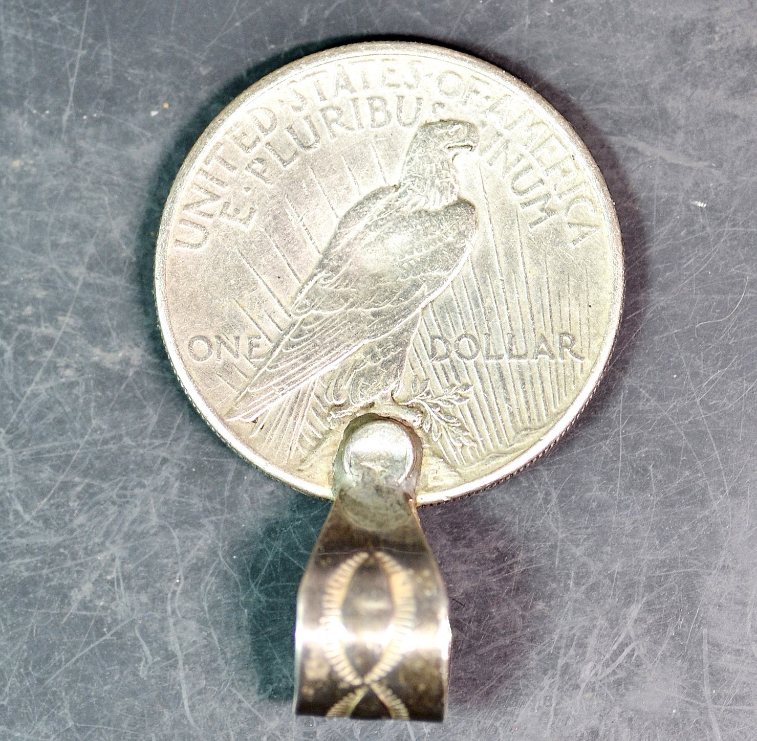 GENUINE U.S. PEACE TYPE SILVER DOLLAR! CRAFTED INTO A NICE PENDANT.