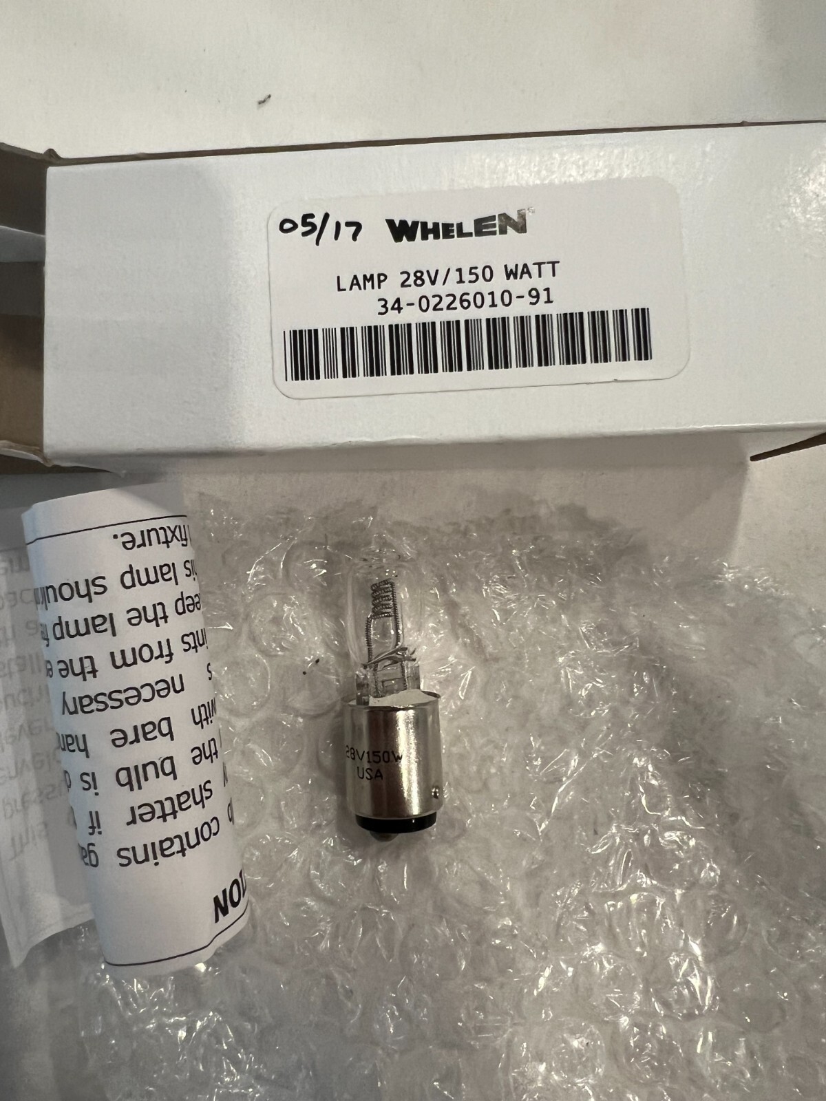 New Whelen halogen lamp in manufacturers packaging with paperwork 34-0226010-91