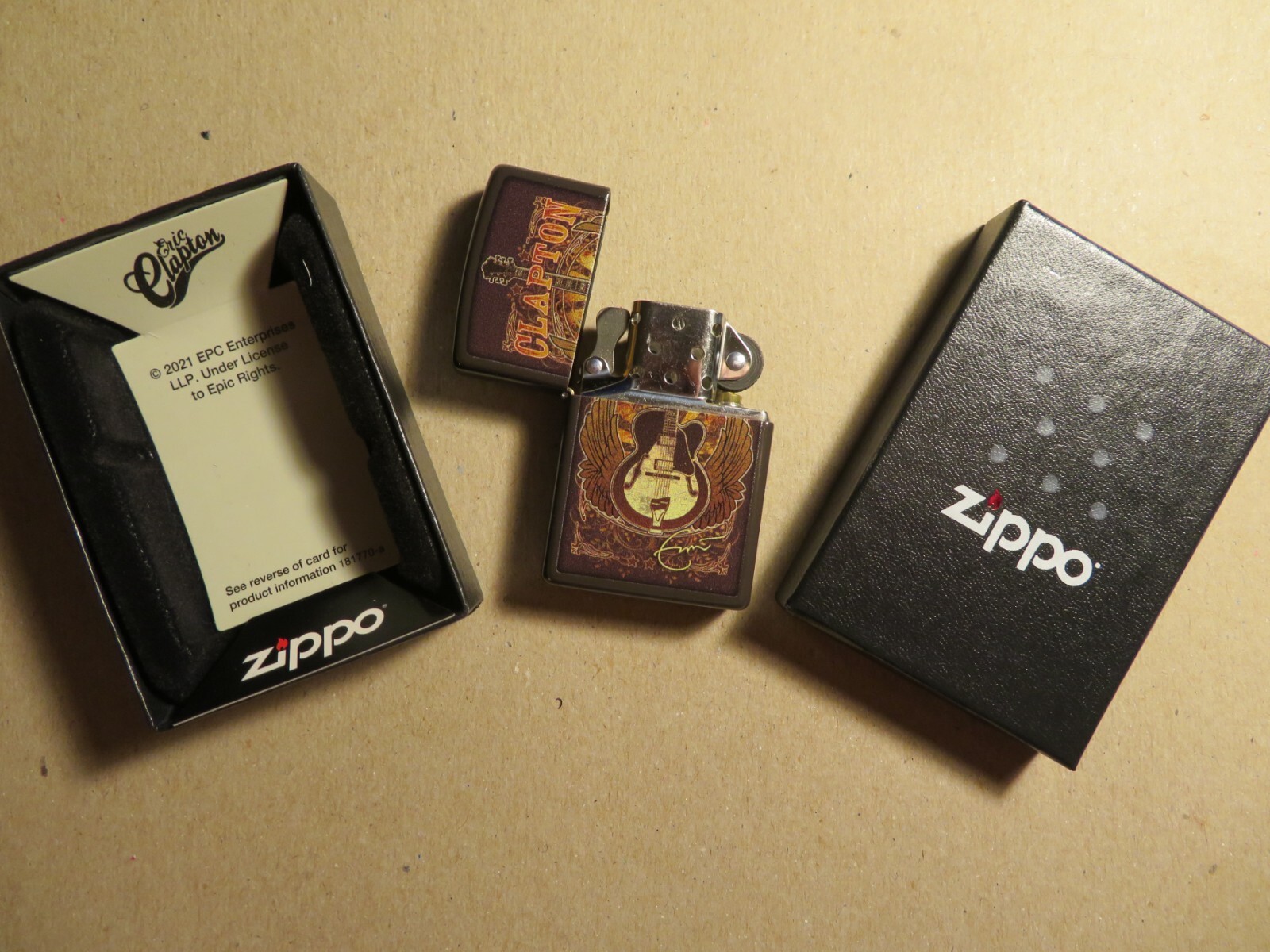 ZIPPO LIGHTER   NEW  ERIC CLAPTON  CLASSIC BROWN WINDPROOF  GUITAR ARTWORK 48196
