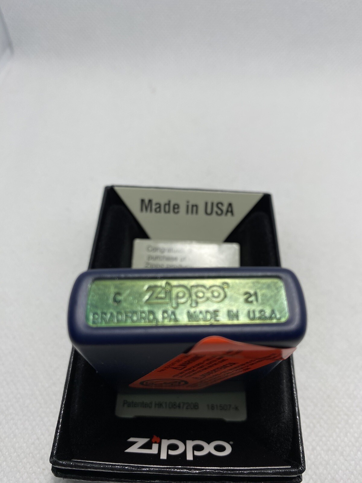 Zippo Compass On A Navy Blue Lighter