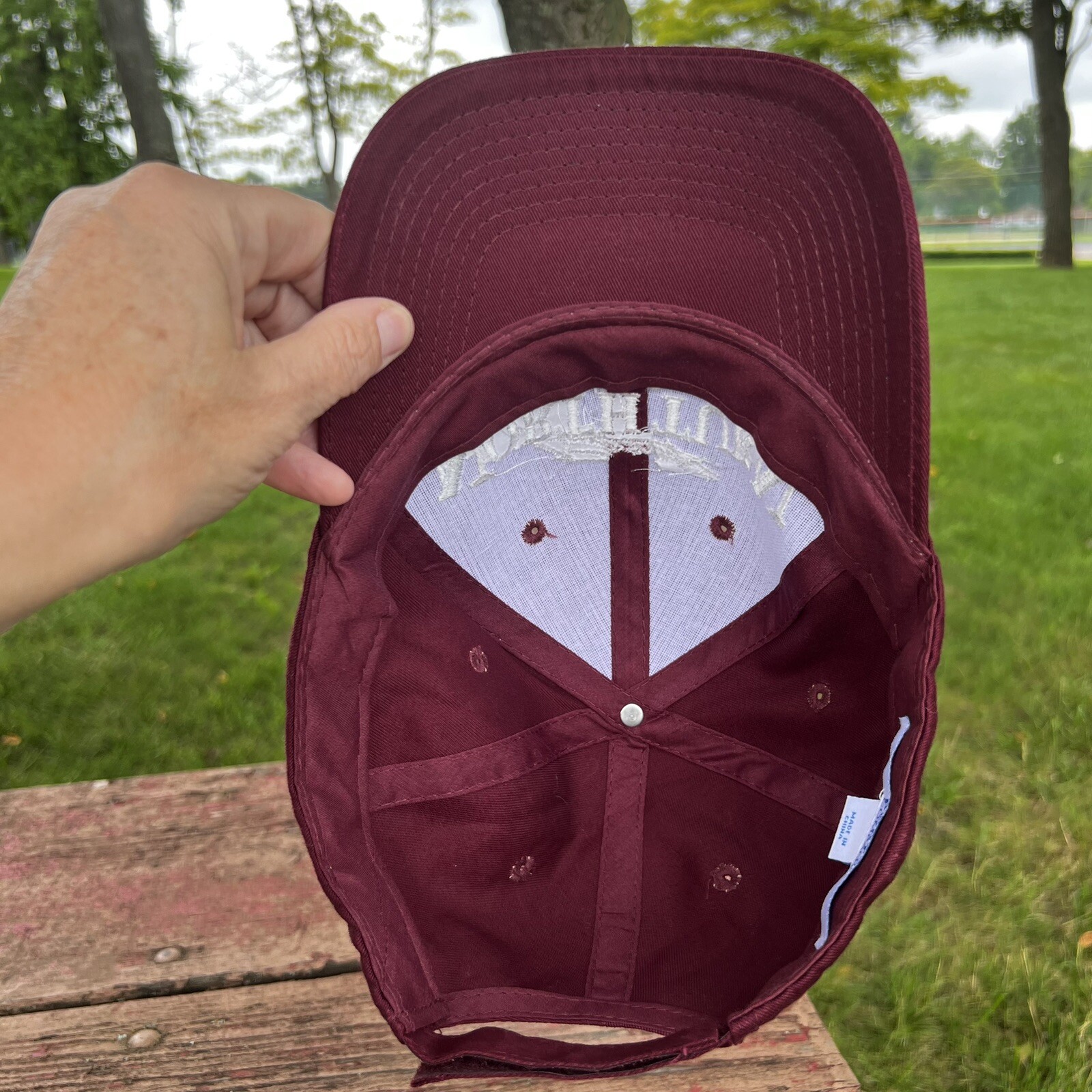 Racings North Turn Beach Bar & Grille in White on Maroon Hat Cap Hook Loop