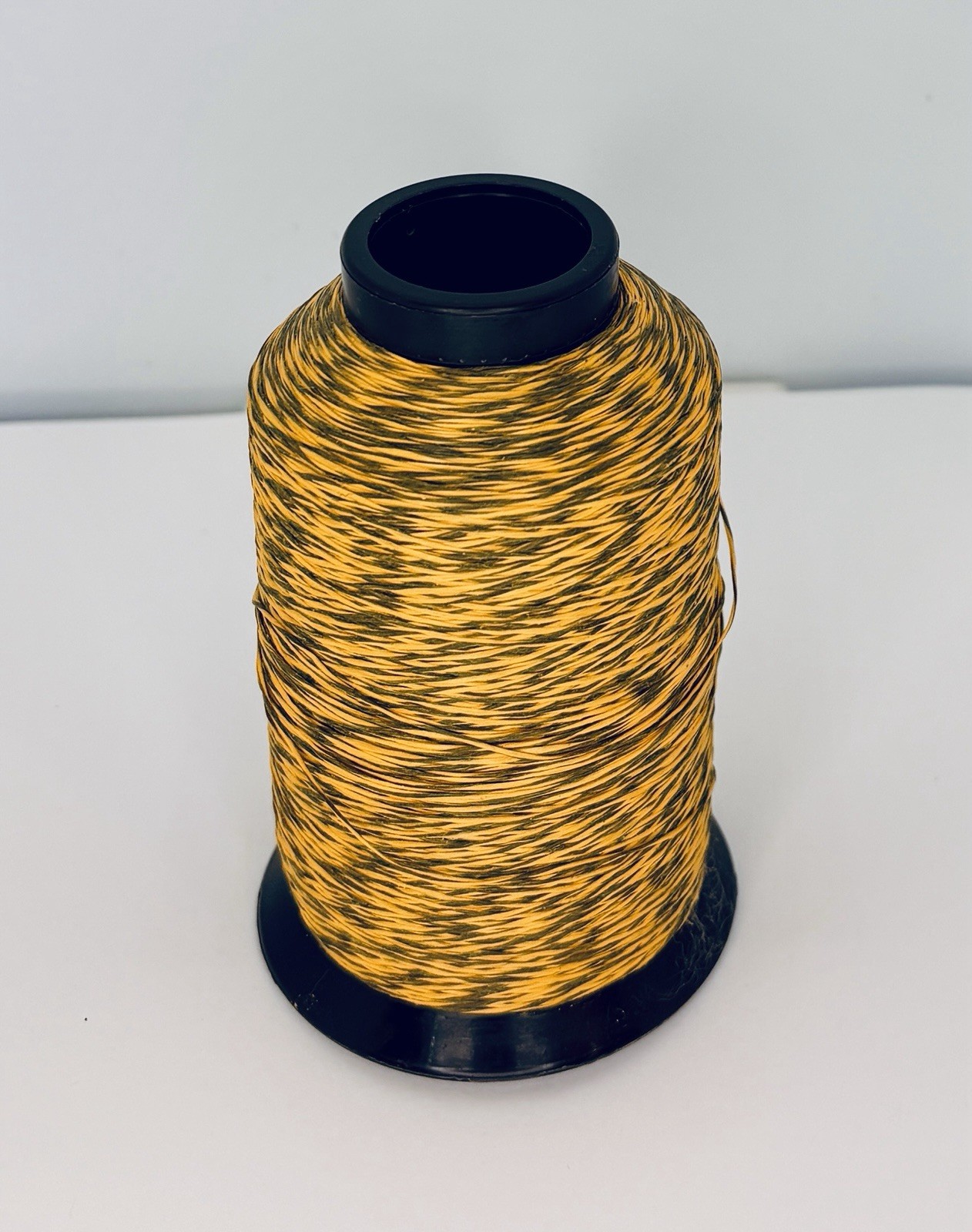 BCY 452X Bowstring Material 1/4 lb Partial spool 4.9 oz. Green/ Yellow Mix
