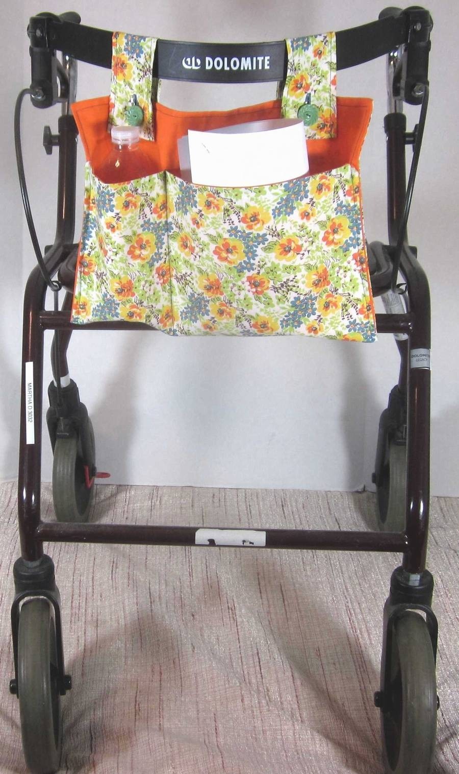 Home Made Walker Bag, 9½" x 14" Flower print with orange lining.