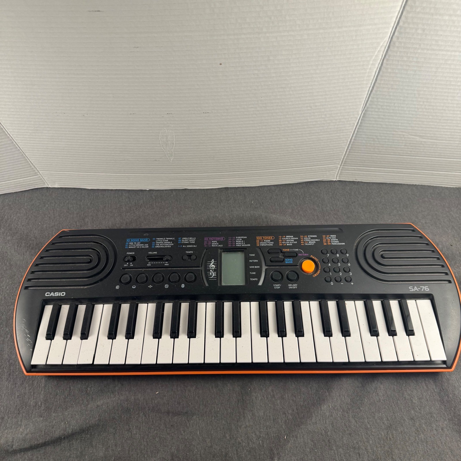 Casio SA-76 44-Key Mini Personal Keyboard Black Orange Digital Piano Portable