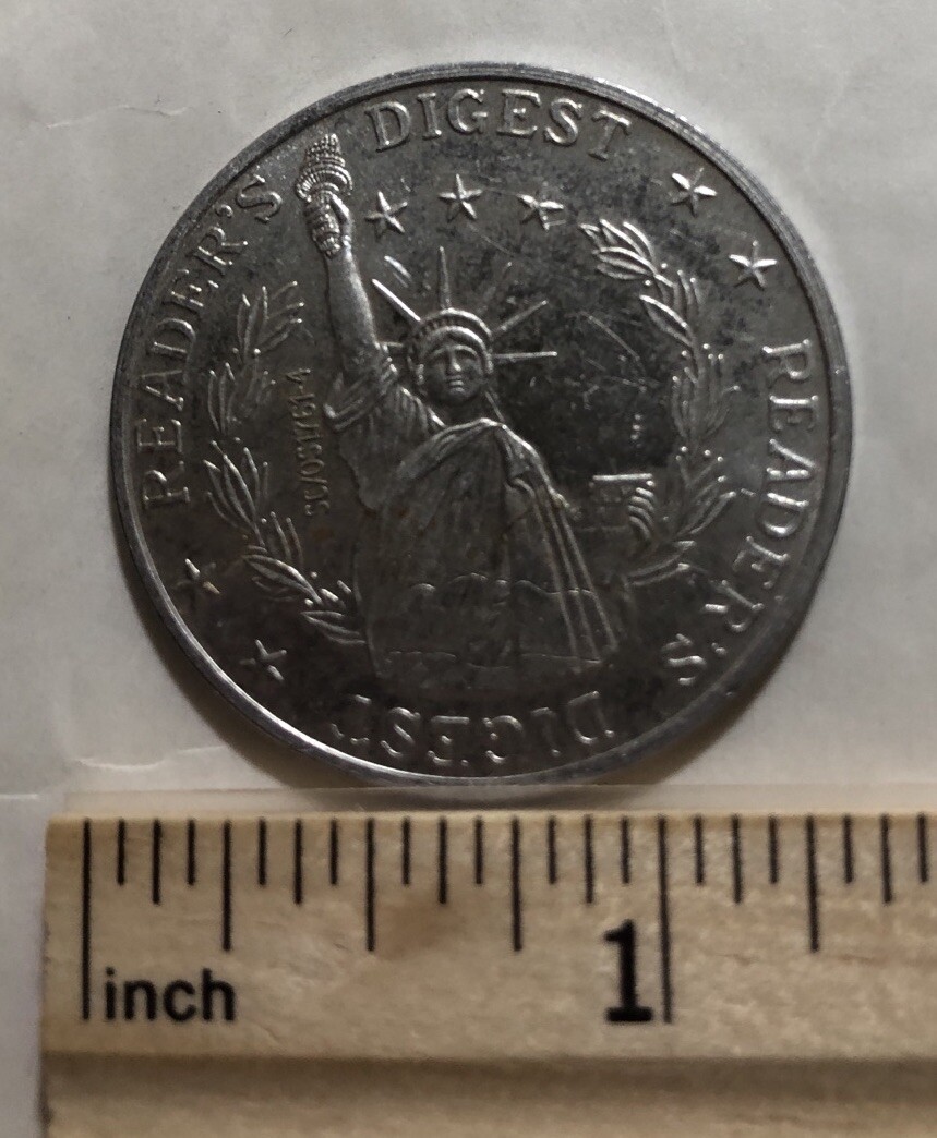 Reader's Diggest Aluminum Token