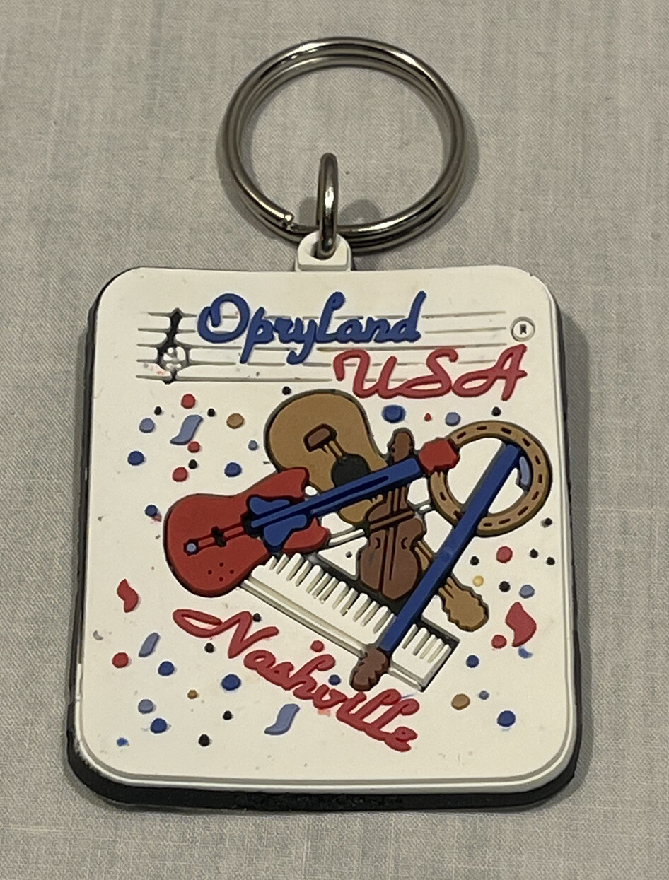 OPRYLAND USA NASHVILLE INSTRUMENT LASER CUT KEYCHAIN COLLECTABLE NEW OLD STOCK