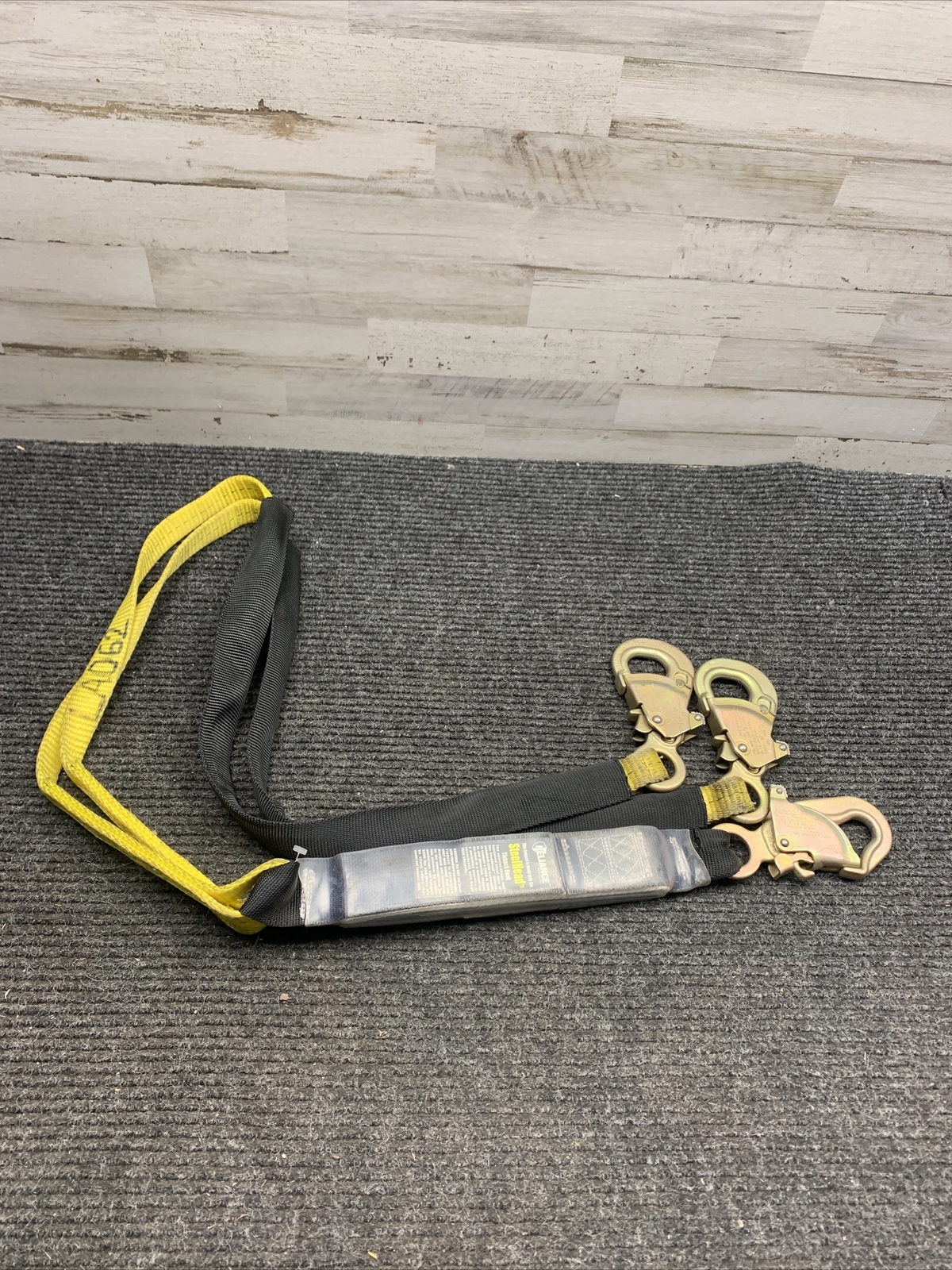 Used Reliance 6 Foot Shock Absorbing Lanyard Black/Yellow