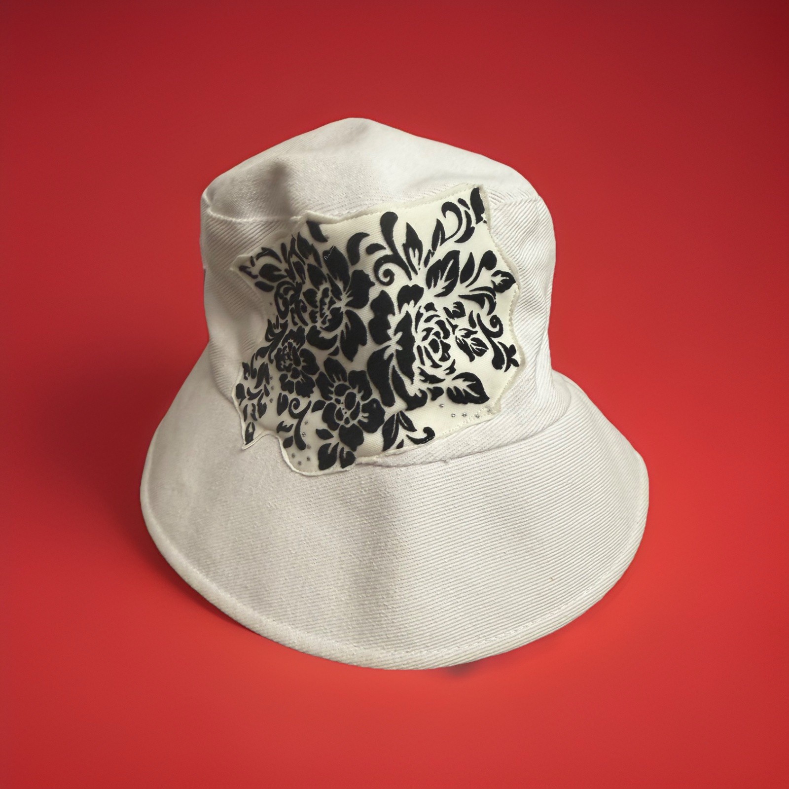 S Threads women’s white and black floral reversible bucket hat.