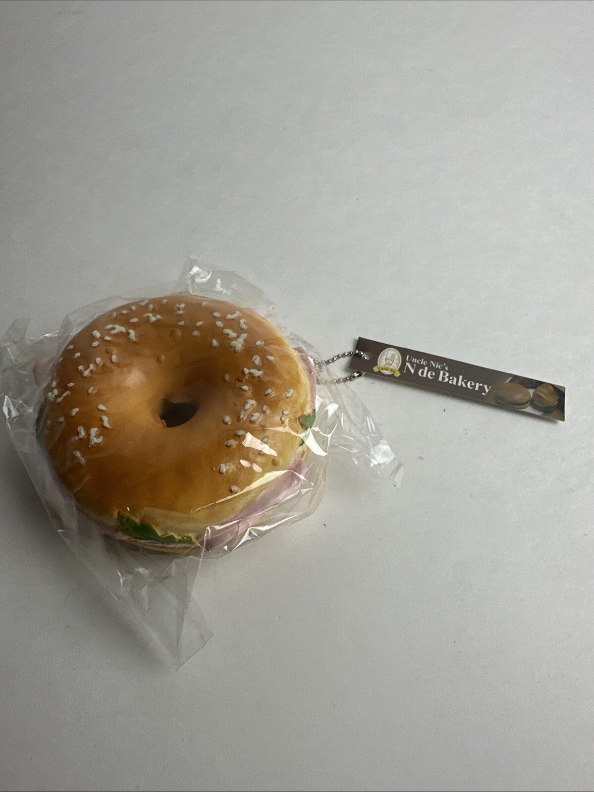 Uncle Nic’s N De Bakery Bagel Sesame Seed Everything squish Charm Sandwich