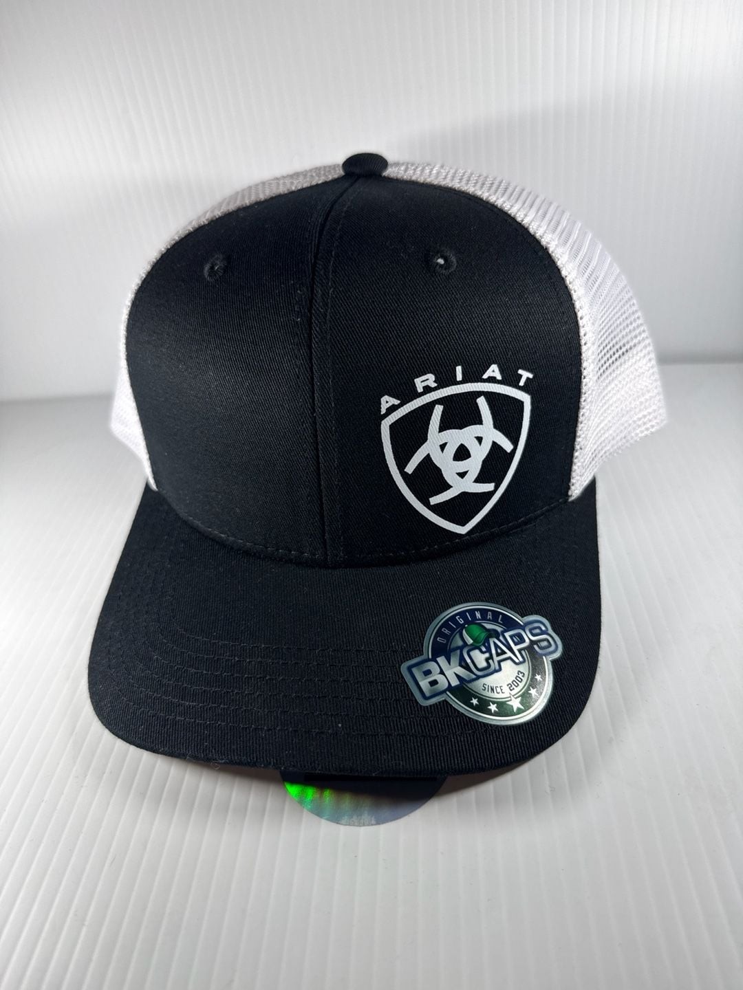 BKCaps 112 Ariat White Shield Logo Black Mesh Back Trucker Hat