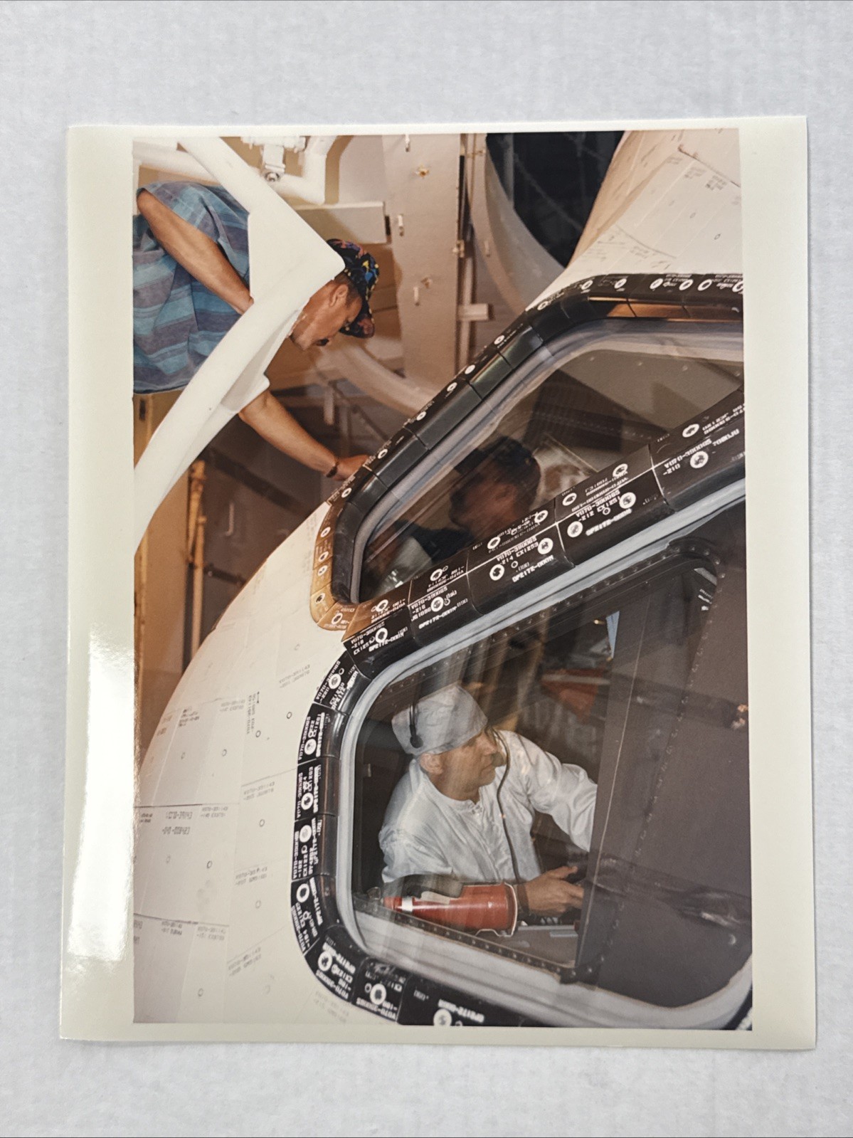 NASA STS 68 Robert Saulnier Polishes Windows of Endeavour Press Photo