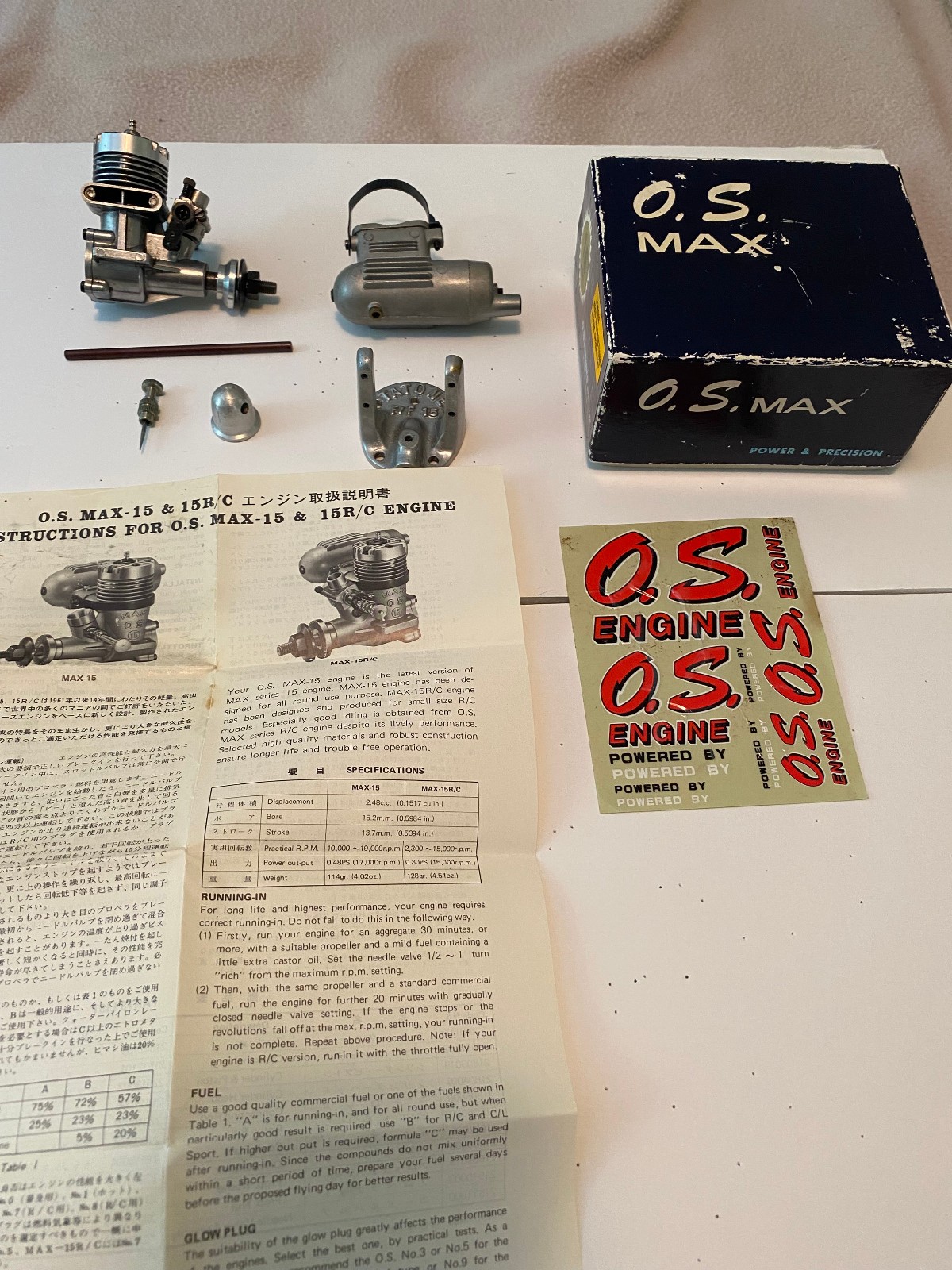 VINTAGE O. S. MAX RC 15 ENGINE AND ASSOCIATED PARTS AND INSTRUCTIONS.