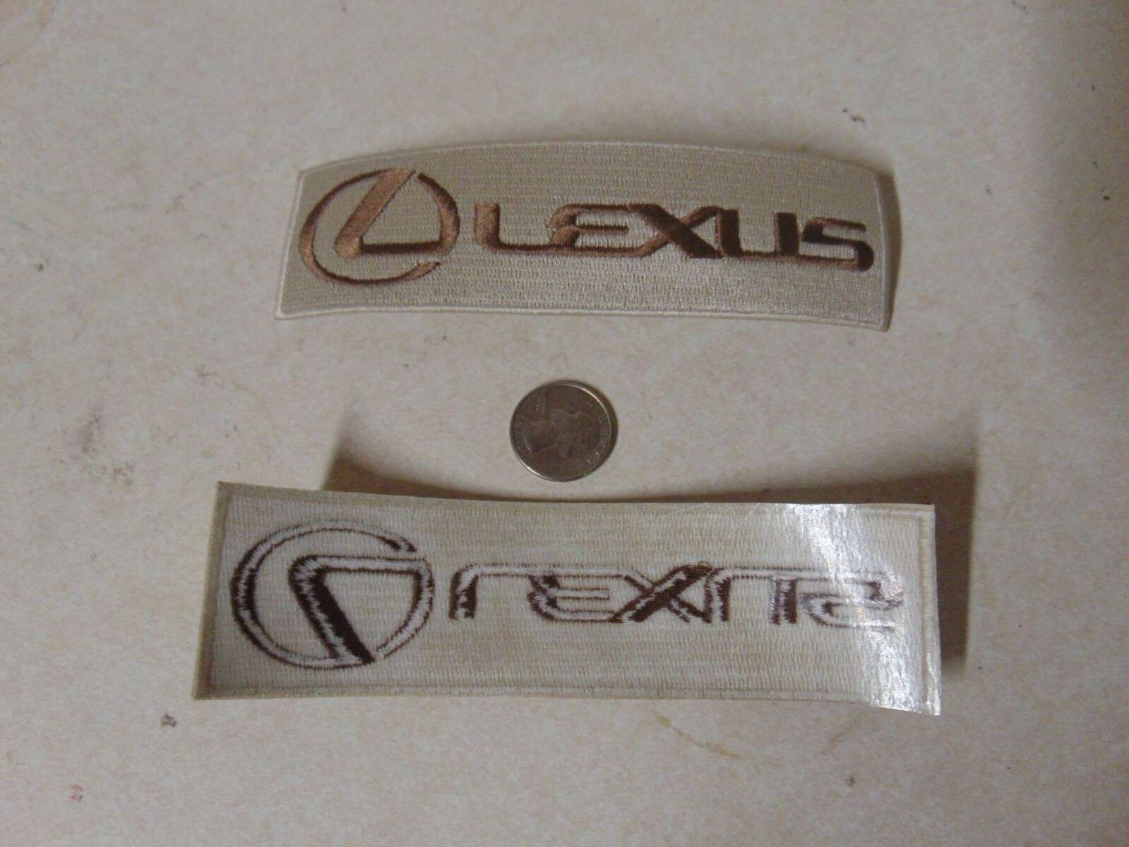 PATCH OLDER SEW ON LEXUS APPROX 5 INCHES TAN AND BROWN