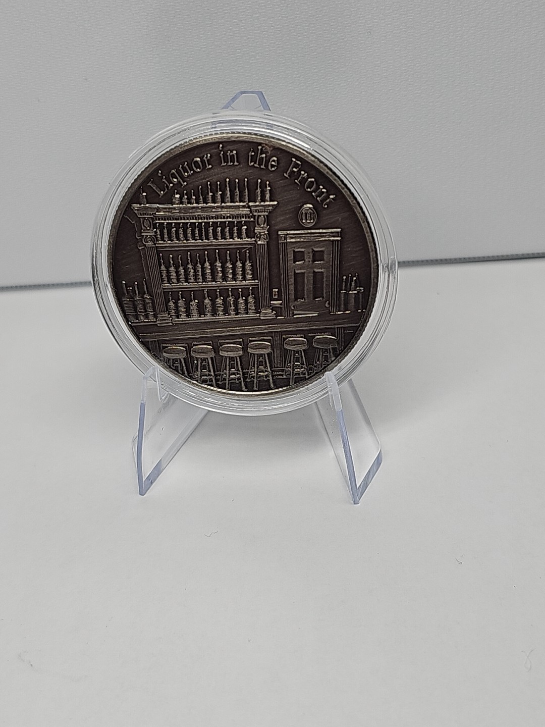 1 oz copper chip with an antique silver-plated finish.