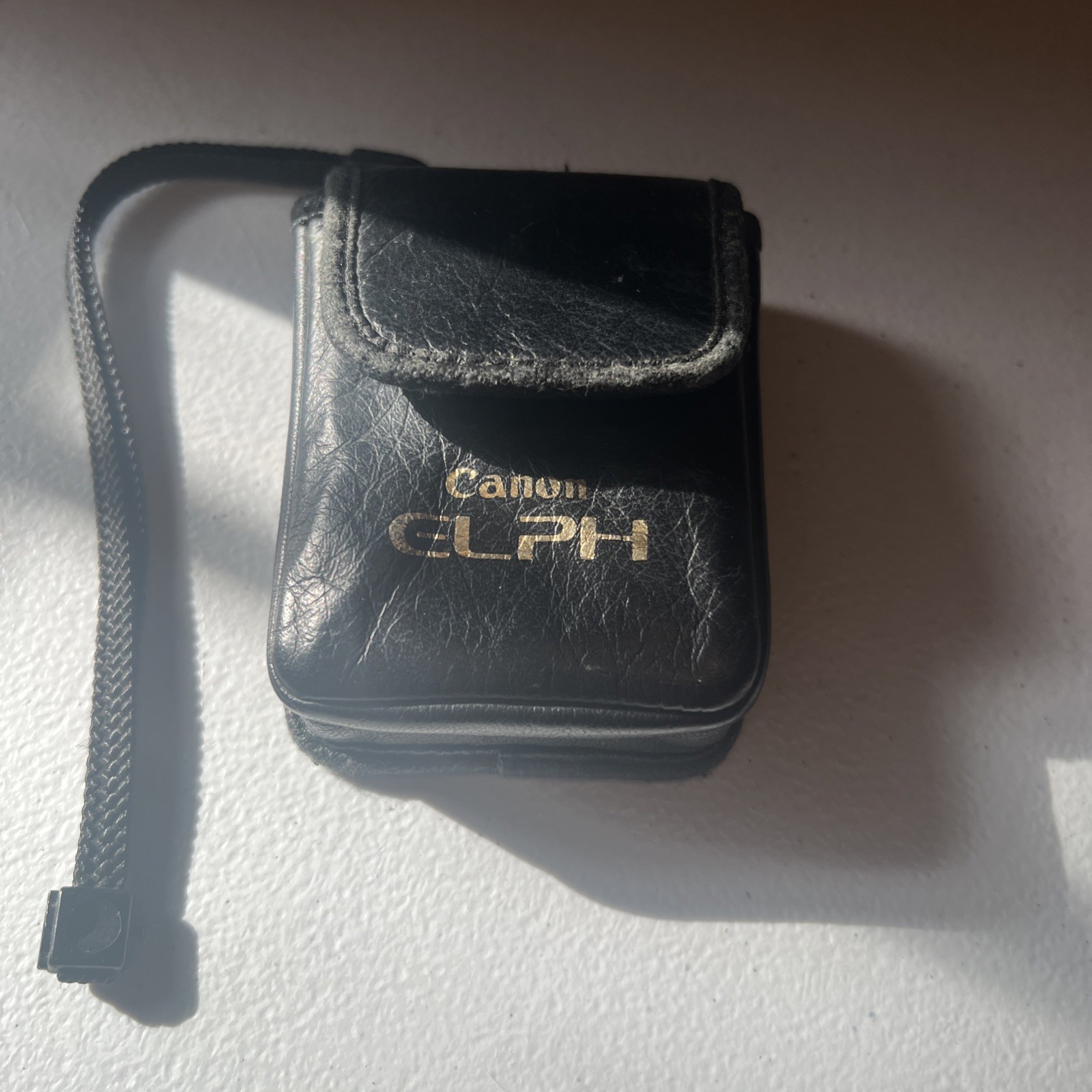 Canon Elph - point and shoot vintage silver camera