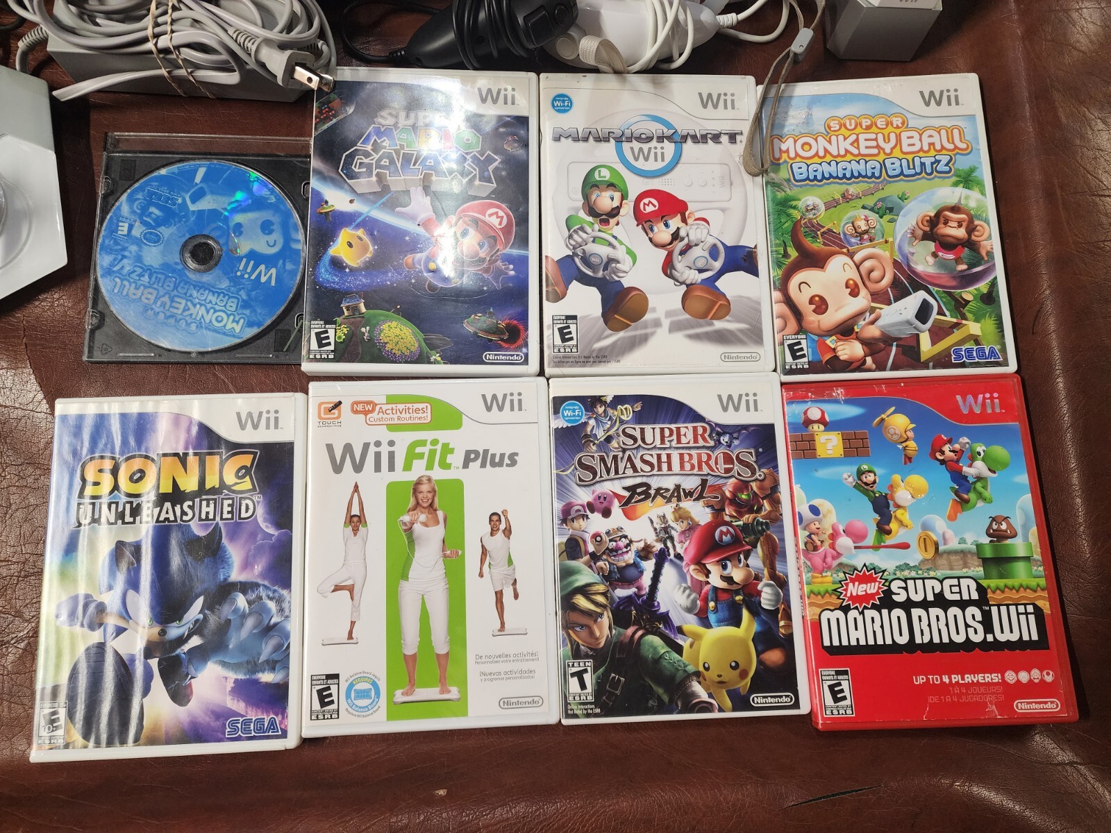 Wii Console plus, 9 games, 2 remotes, 1 nunchuck, System Plus Hookups & More