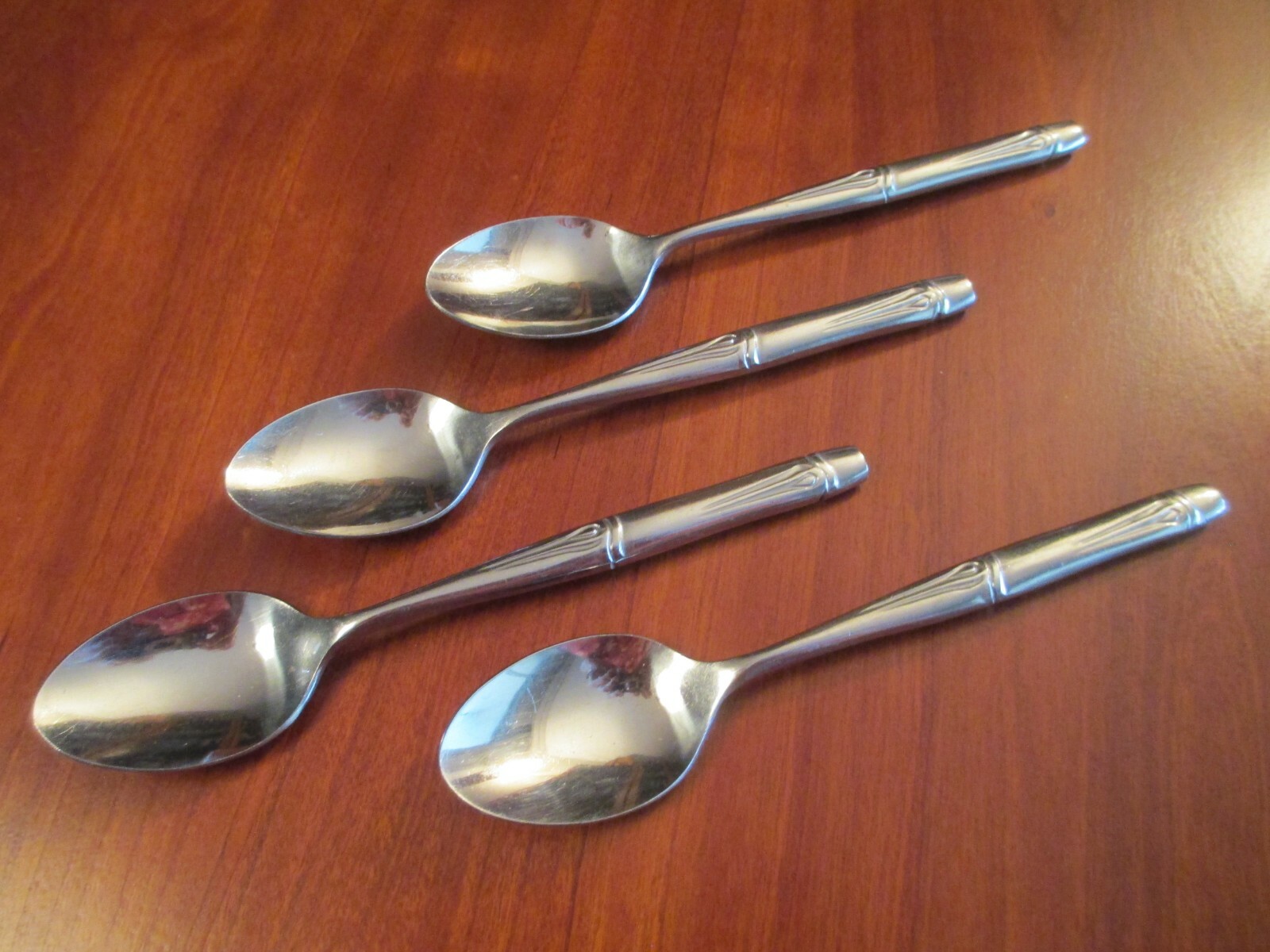 Four Oxford Hall Bamboo stainless steel teaspoons made in Japan nice condition