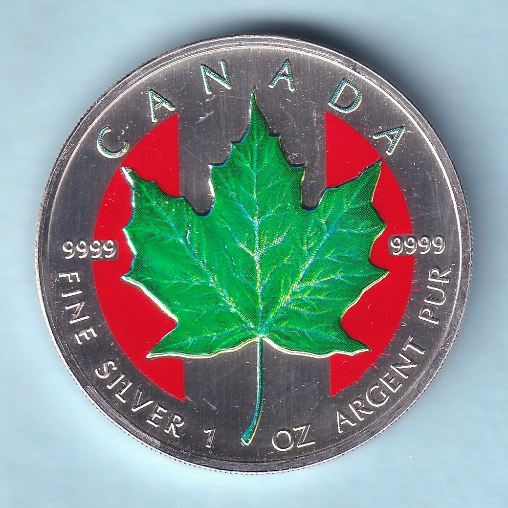 Canada. 1999 1 oz Silver -  Coloured  5 Dollars. Green Maple Leaf.. UNC