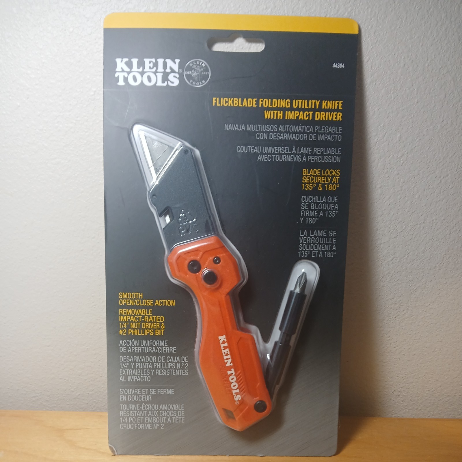 Klein Tools FlickBlade Folding Utility Knife Steel Blade Orange Plastic Handle.