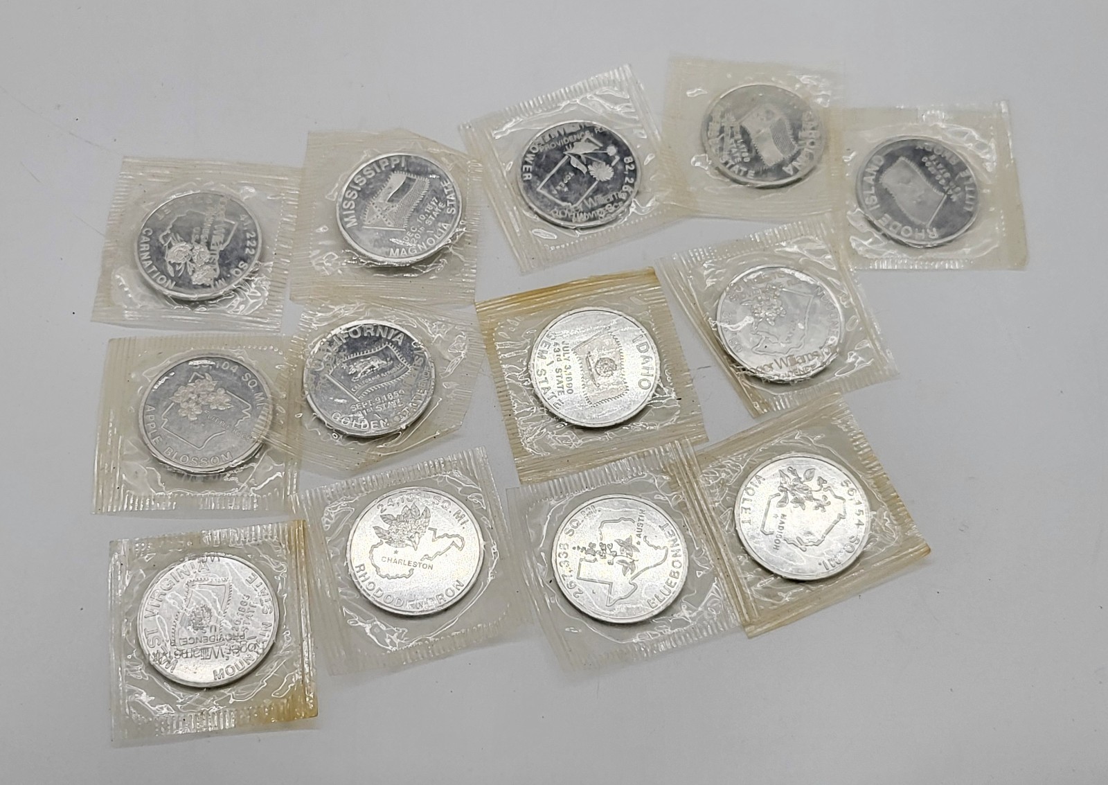 13 Roger Williams Mint state coins, all sealed