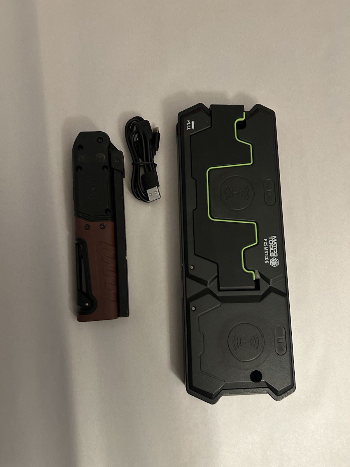 Matco Tools Pro Charge Folding Light And Dual Wireless Charging Pad.